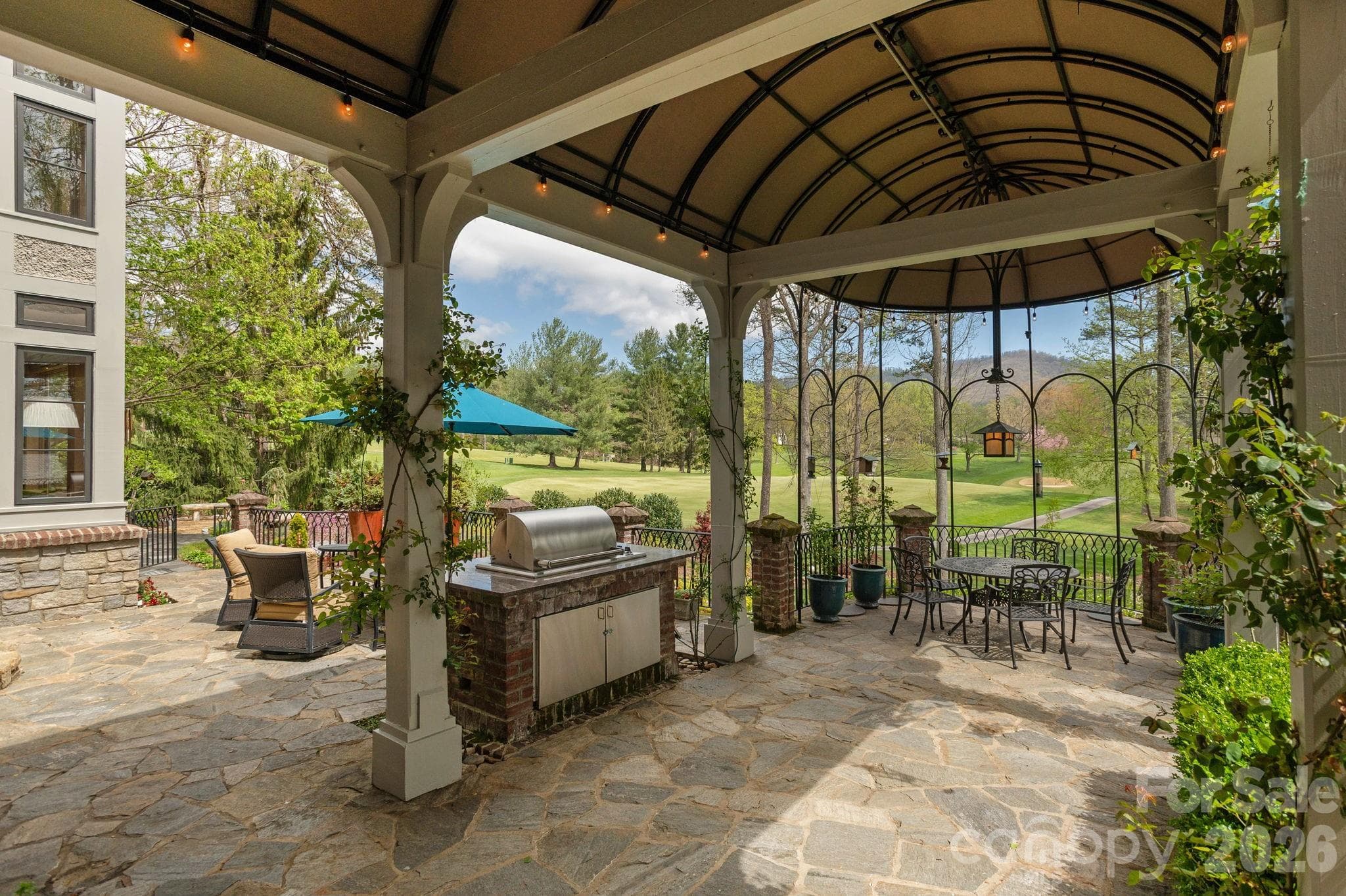 Covered terrace overlooking the Biltmore Forest Country Club golf course - 8 Fairway Place, Asheville