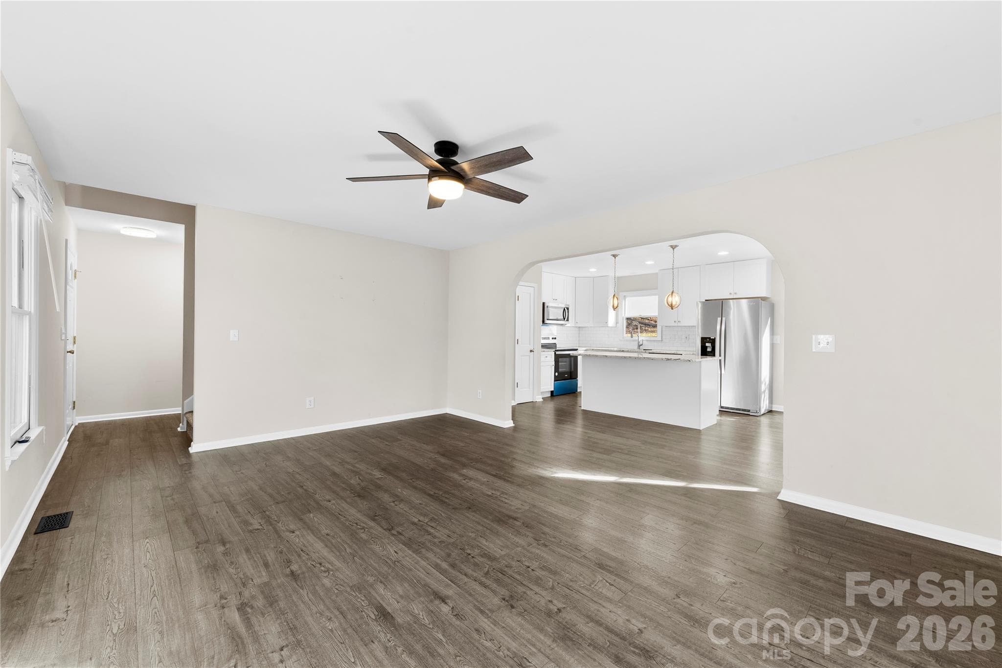 LIVINGROOM SHOWING ENTRY WAY AND KITCHEN - 16218 Barbee Road, Stanfield