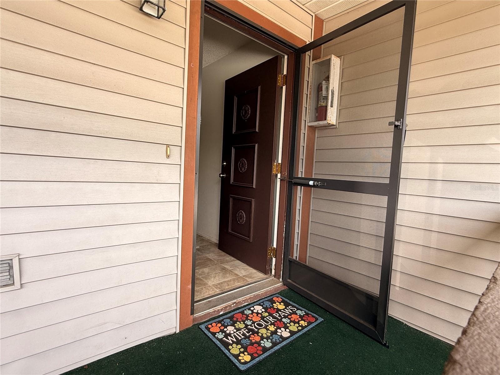 Screen door- let the fresh air in - 12155 ENVIRONMENTAL DR #6, NEW PORT RICHEY