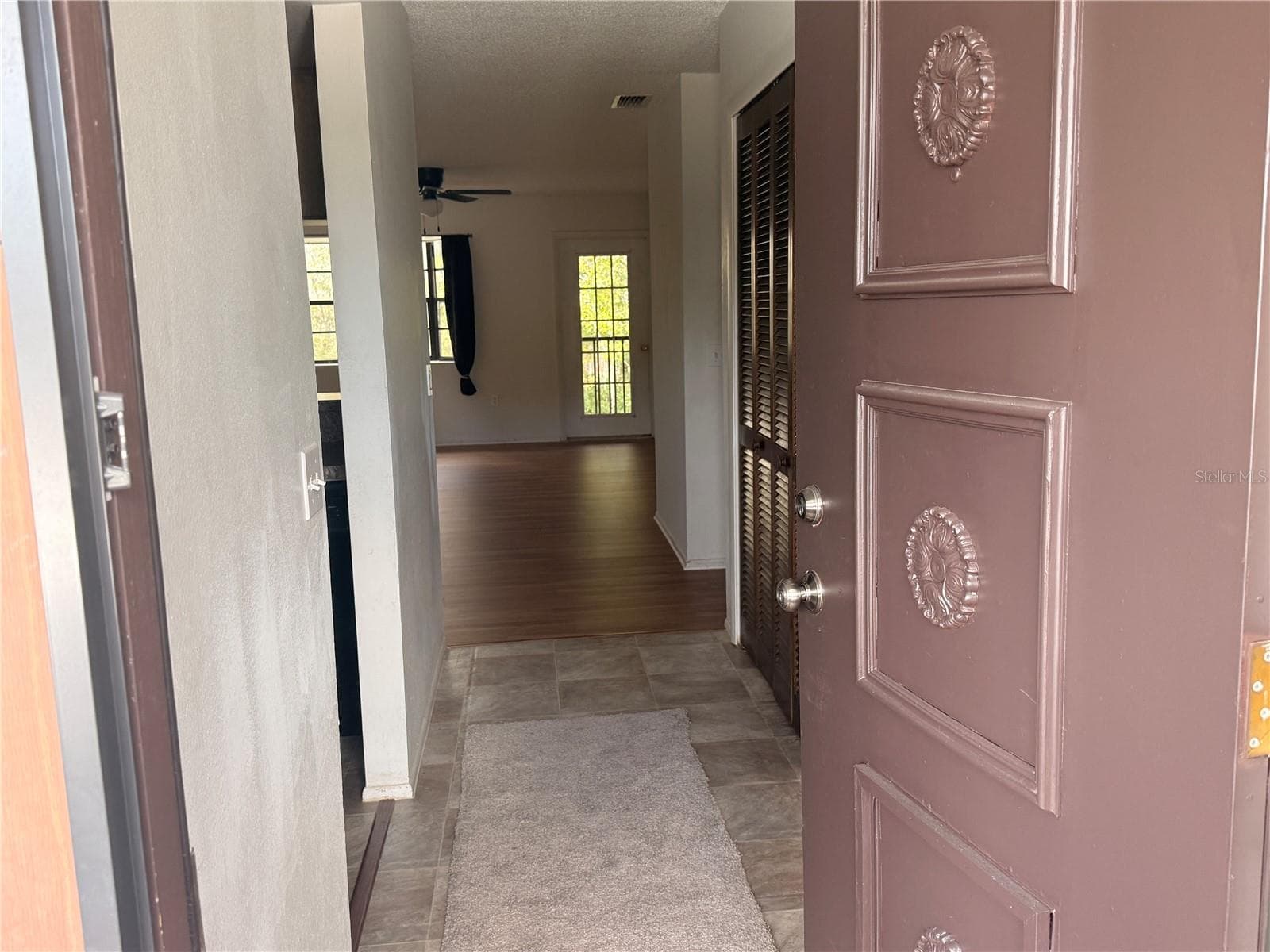 Nice front door and foyer - 12155 ENVIRONMENTAL DR #6, NEW PORT RICHEY