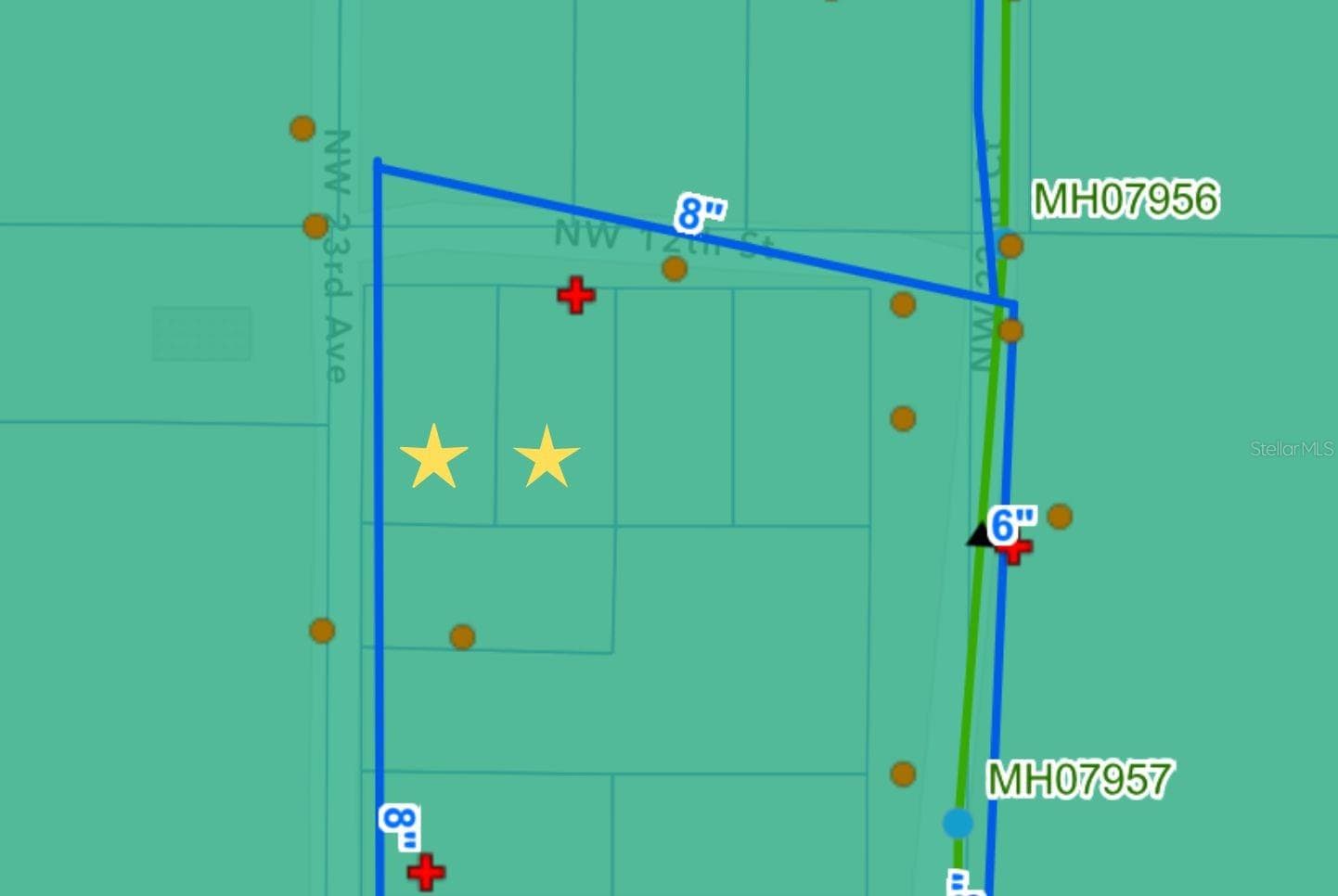 Utility map: yellow star is the vacant lots, red plus sign is a fire hydrant, orange circle is power poles - 2264 NW 12TH ST, OCALA