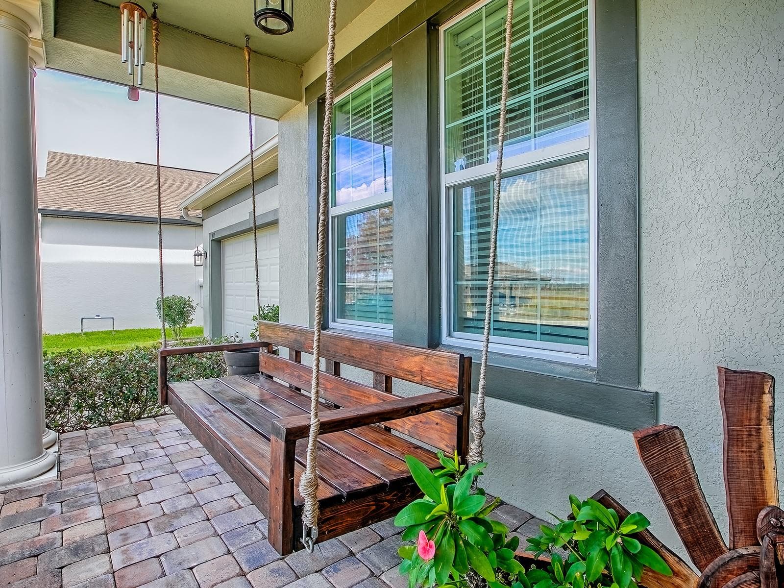 Covered Front Porch Offering Tranquil Canal and Conservation Views - 417 BLUE CYPRESS DR, GROVELAND