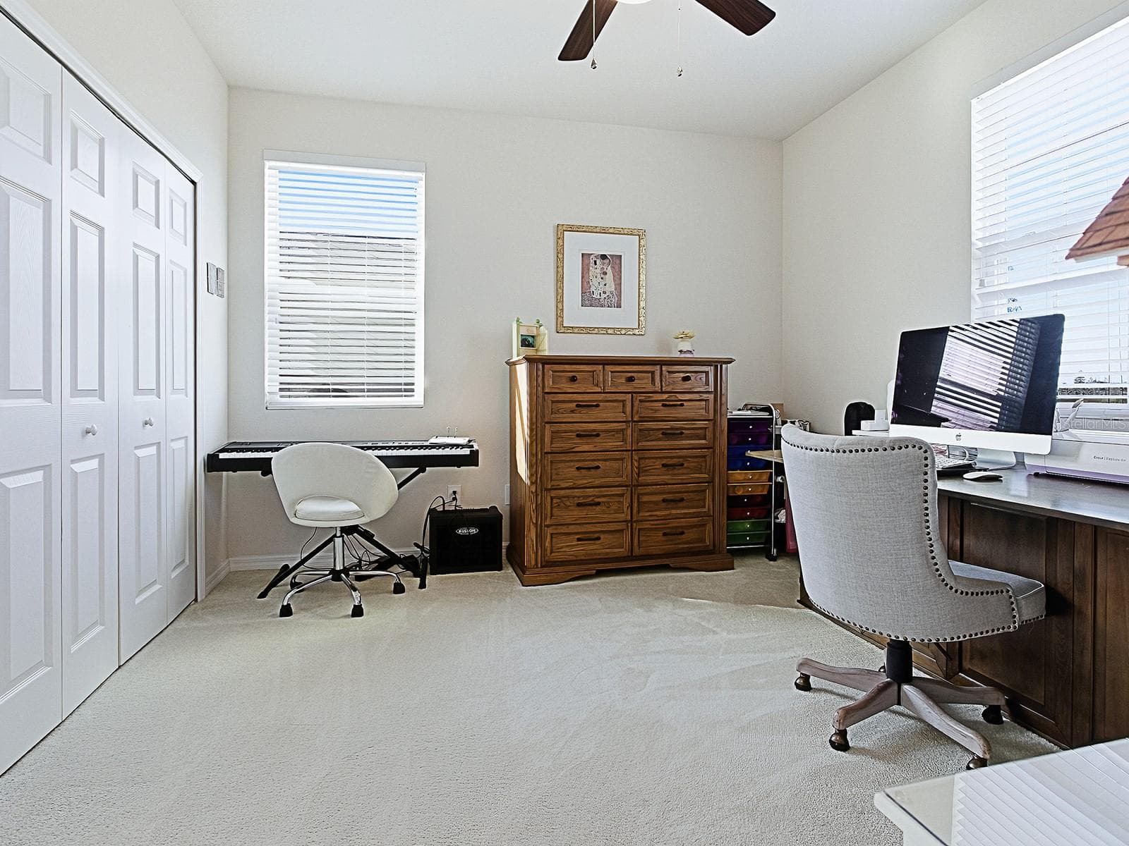 Bedroom with en-suite full bath and tranquil canal and conservation area views. - 417 BLUE CYPRESS DR, GROVELAND