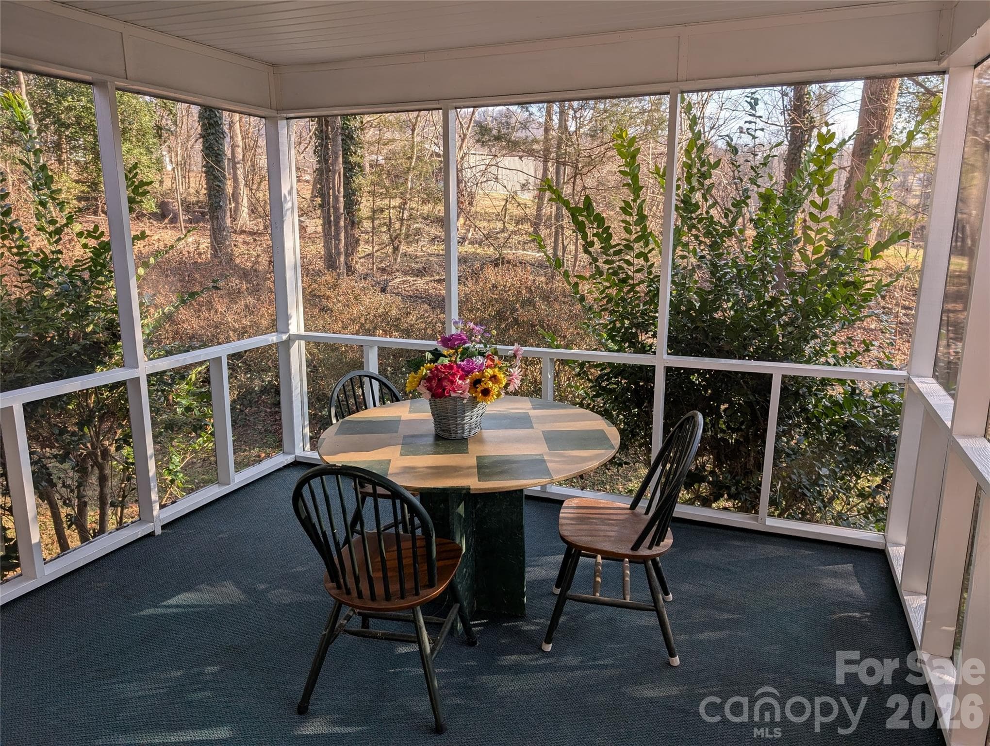 screened porch is great for reading or diner parties - 3065 Woodstream Drive, Valdese
