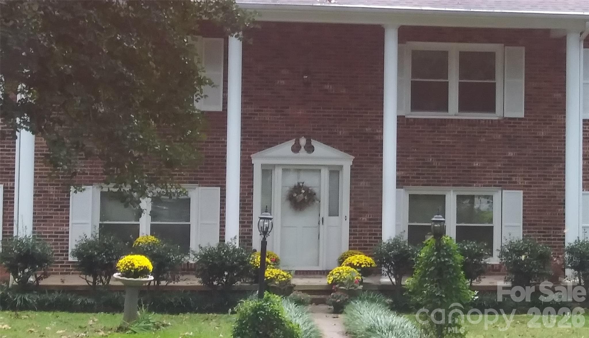 fall flowers make all the difference. - 3065 Woodstream Drive, Valdese