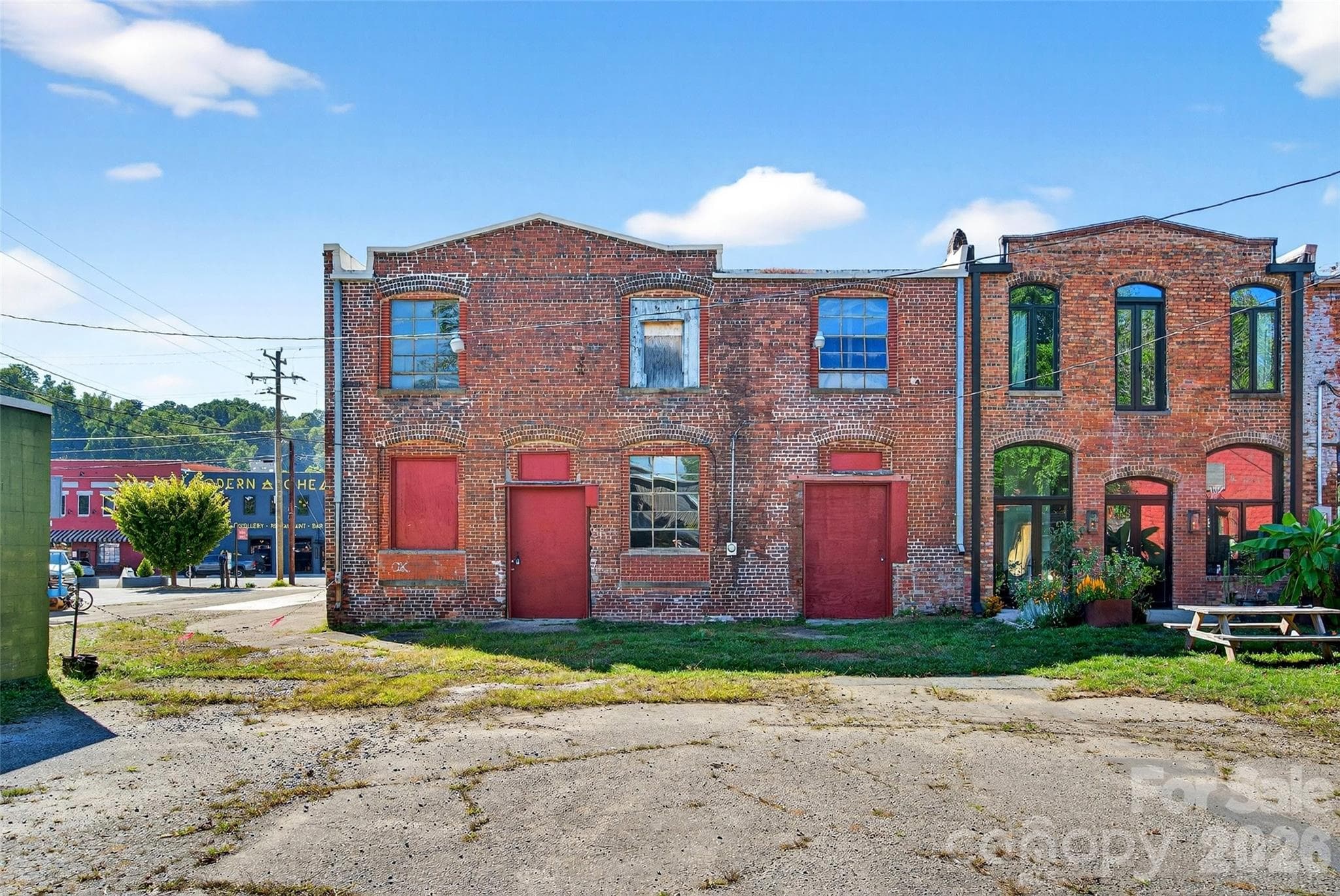 Rear building features 2 large doors. - 47 Catawba Avenue, Old Fort