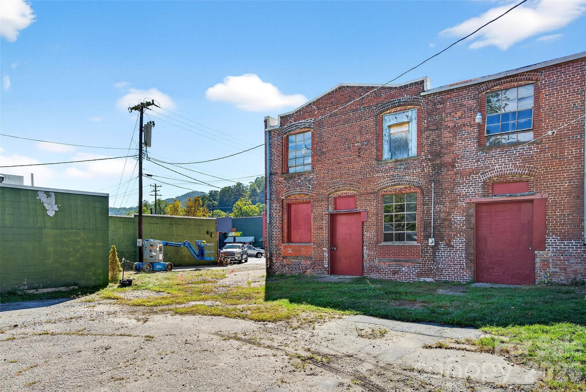 Includes an asphalt parking lot. - 47 Catawba Avenue, Old Fort
