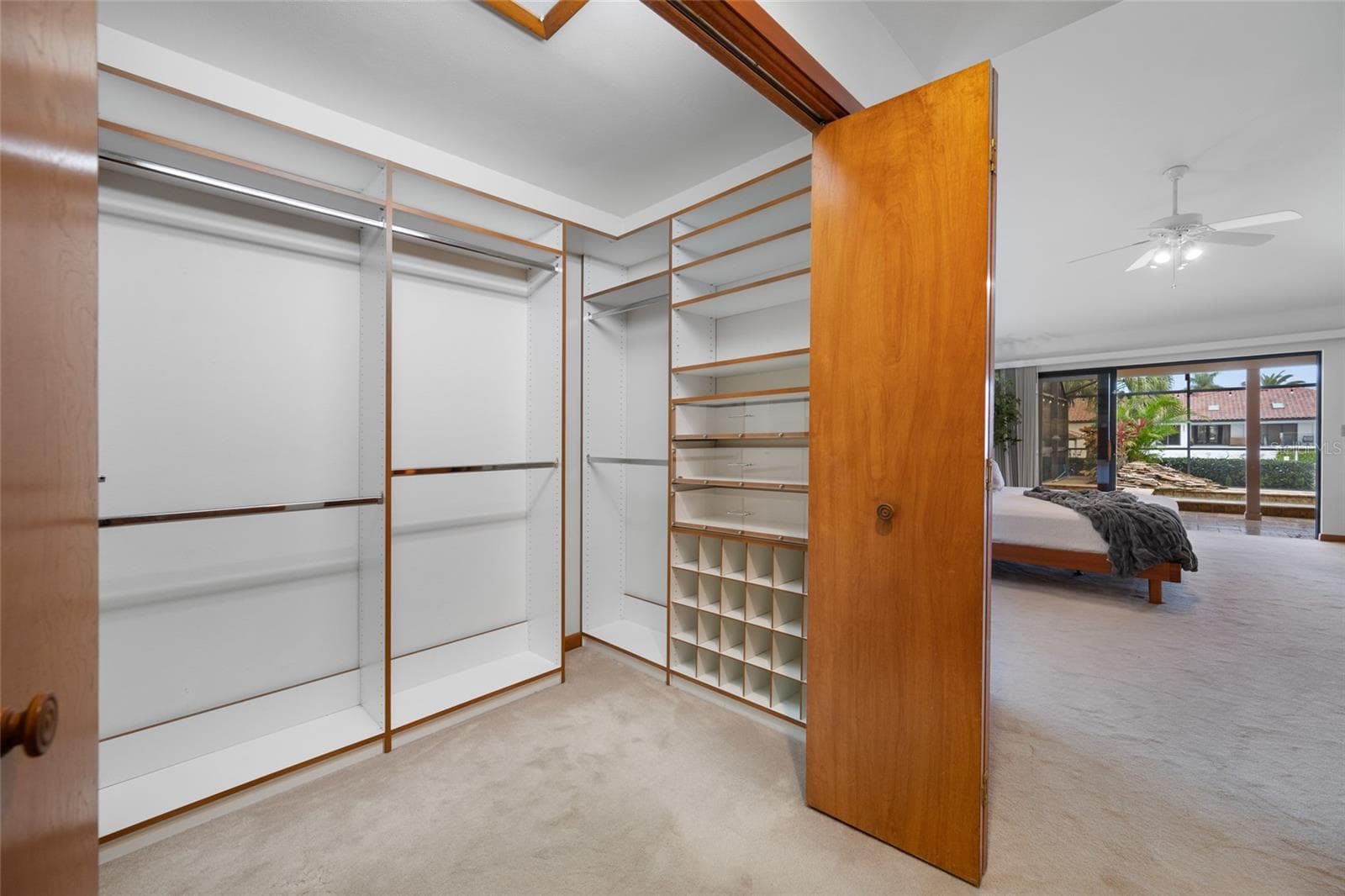 Primary bedroom custom closet - 9807 COMPASS POINT WAY, TAMPA