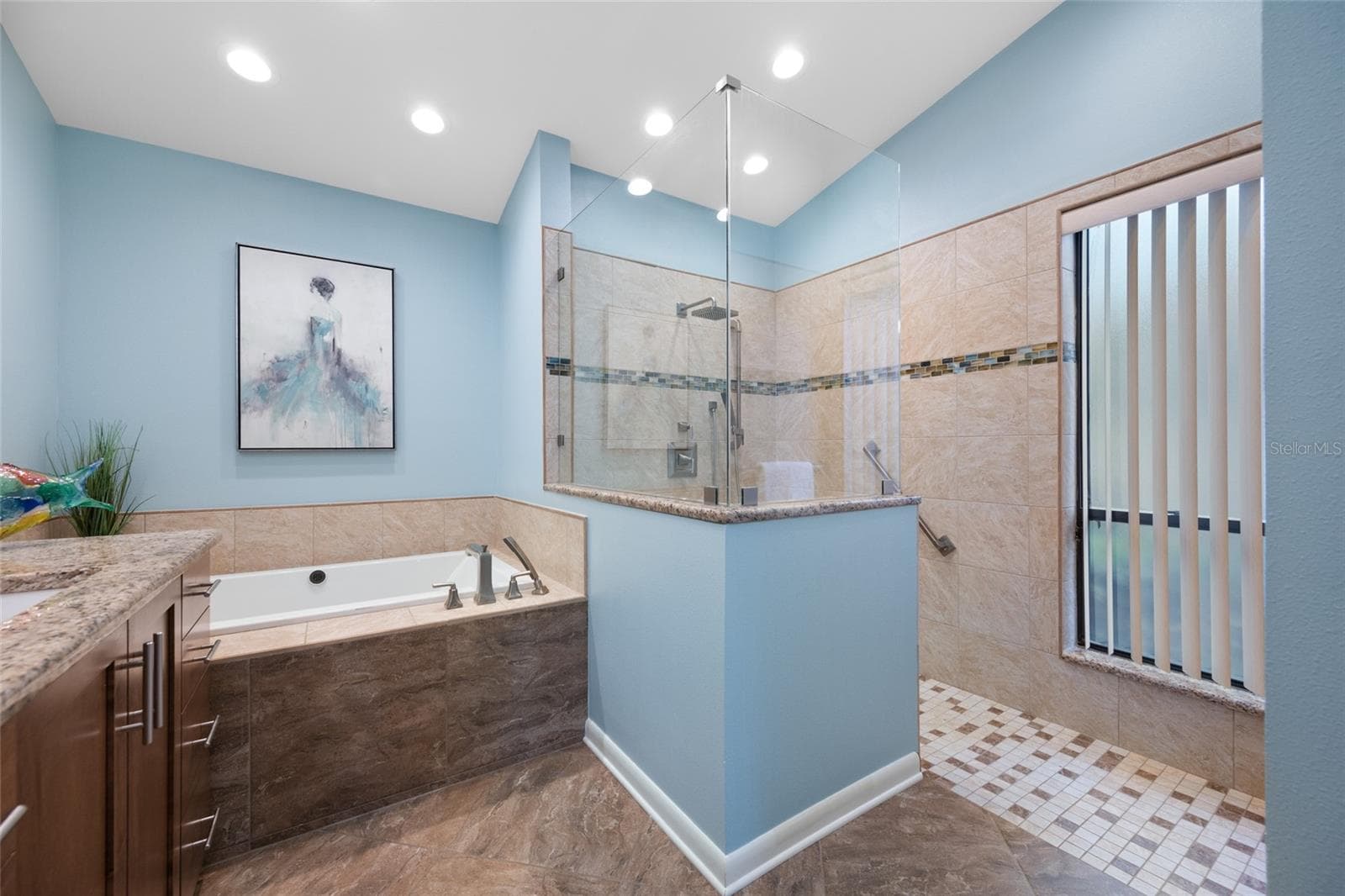Primary bedroom ensuite bathroom with zero entry shower - 9807 COMPASS POINT WAY, TAMPA
