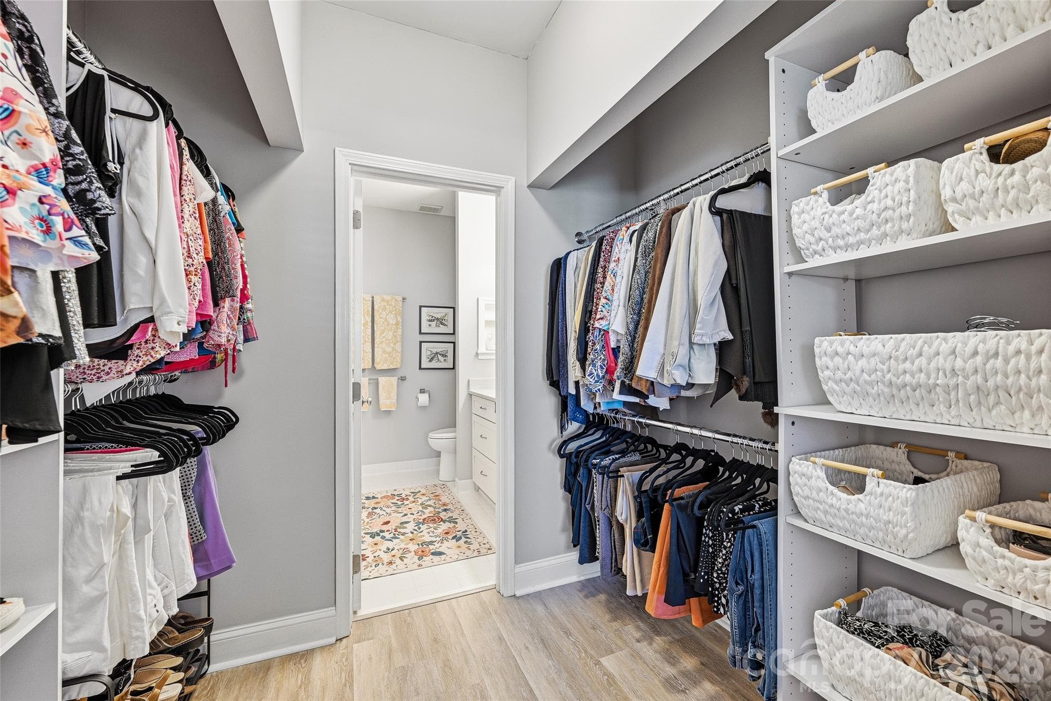 Primary walk-through closet - 18824 Nautical Drive, Cornelius