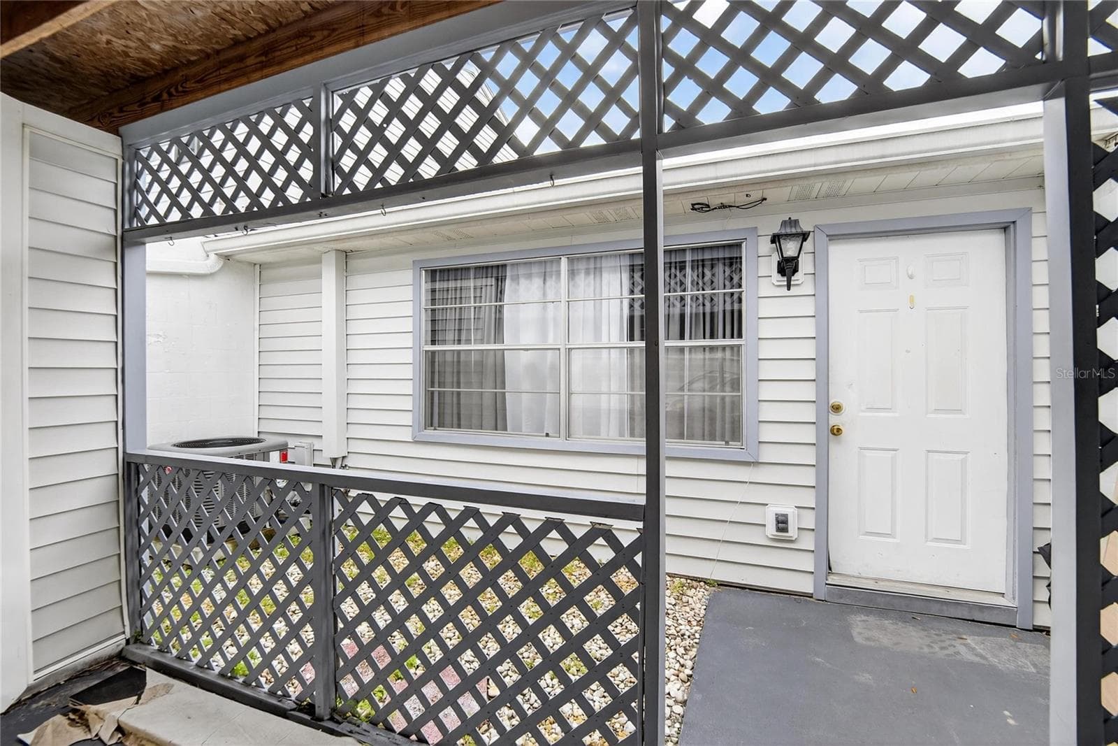 Front Door and small  Courtyard view from Garage Access - 11920 DIETZ DR #11920, TAMPA