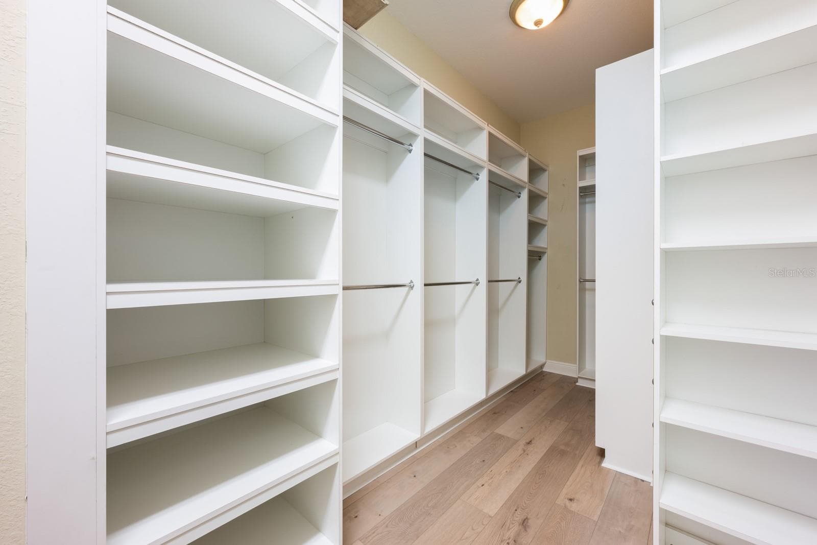 Custom owner's suite walk-in closet. - 5092 NE 81ST BLVD, WILDWOOD