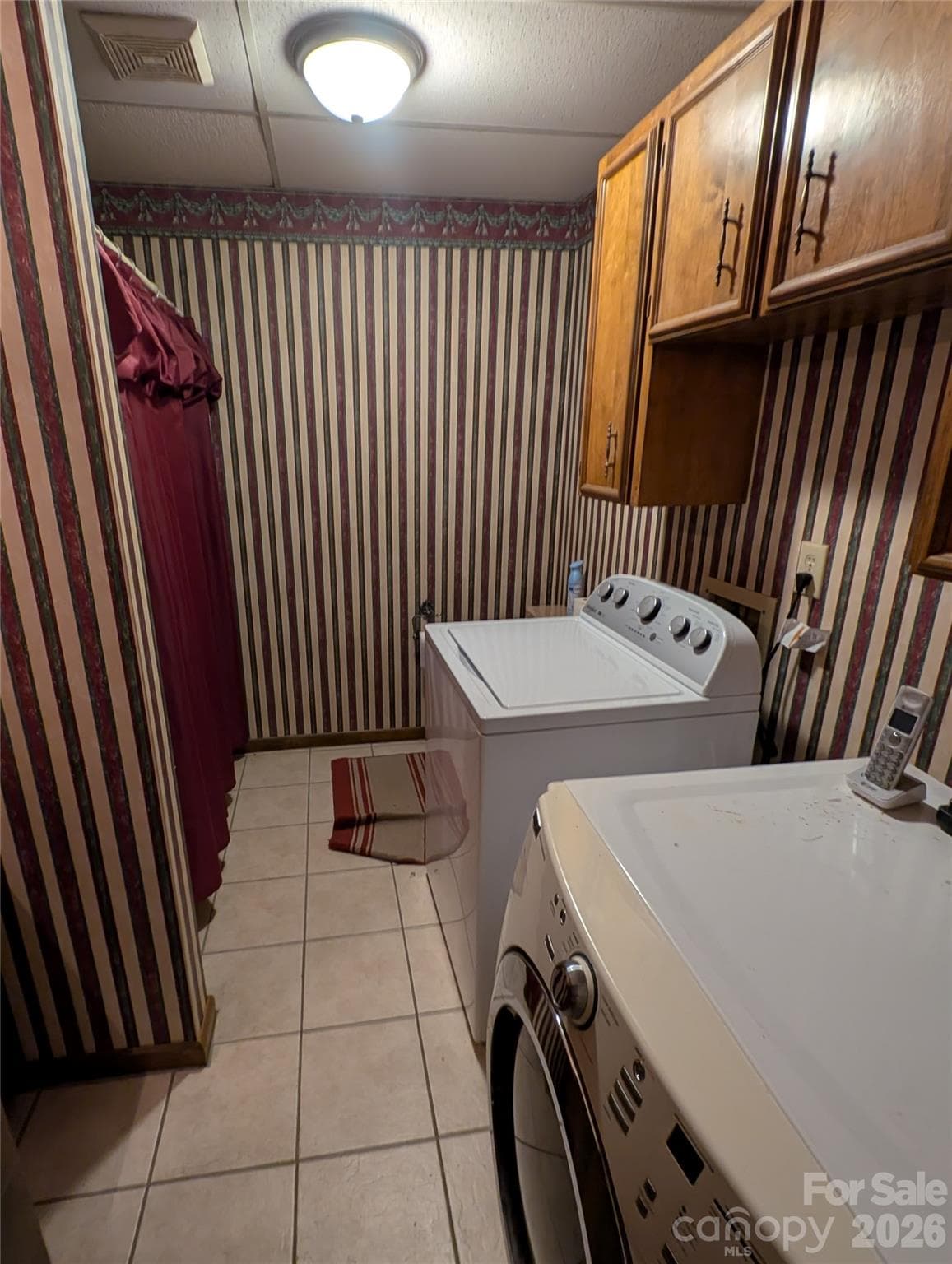 lower bathroom 3 with tile floors,and washer dryer laundry. - 3065 Woodstream Drive, Valdese