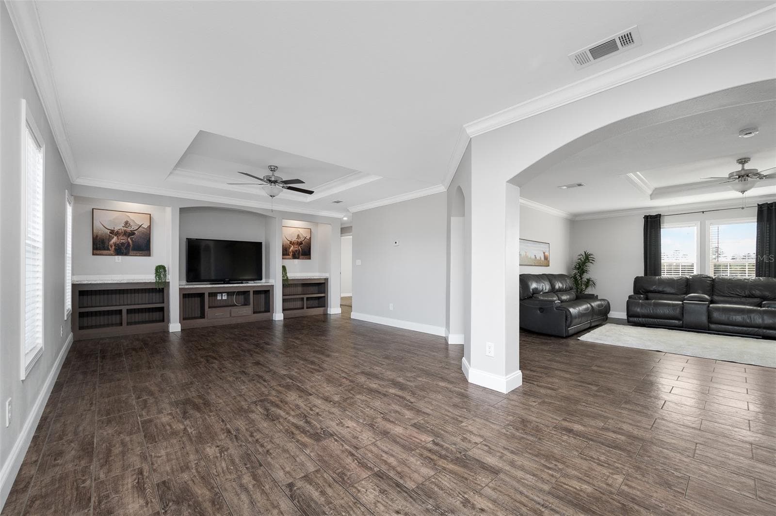 View from dining area to 2 large living spaces - 3789 NW 202ND ST, NEWBERRY