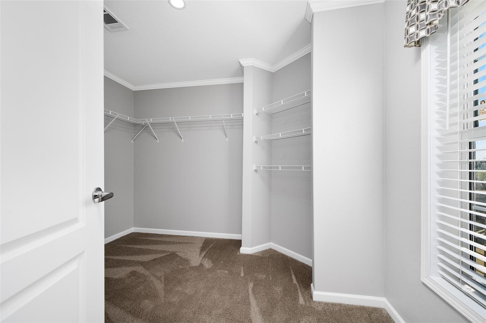 Large walk-in closet in primary bedroom - 3789 NW 202ND ST, NEWBERRY