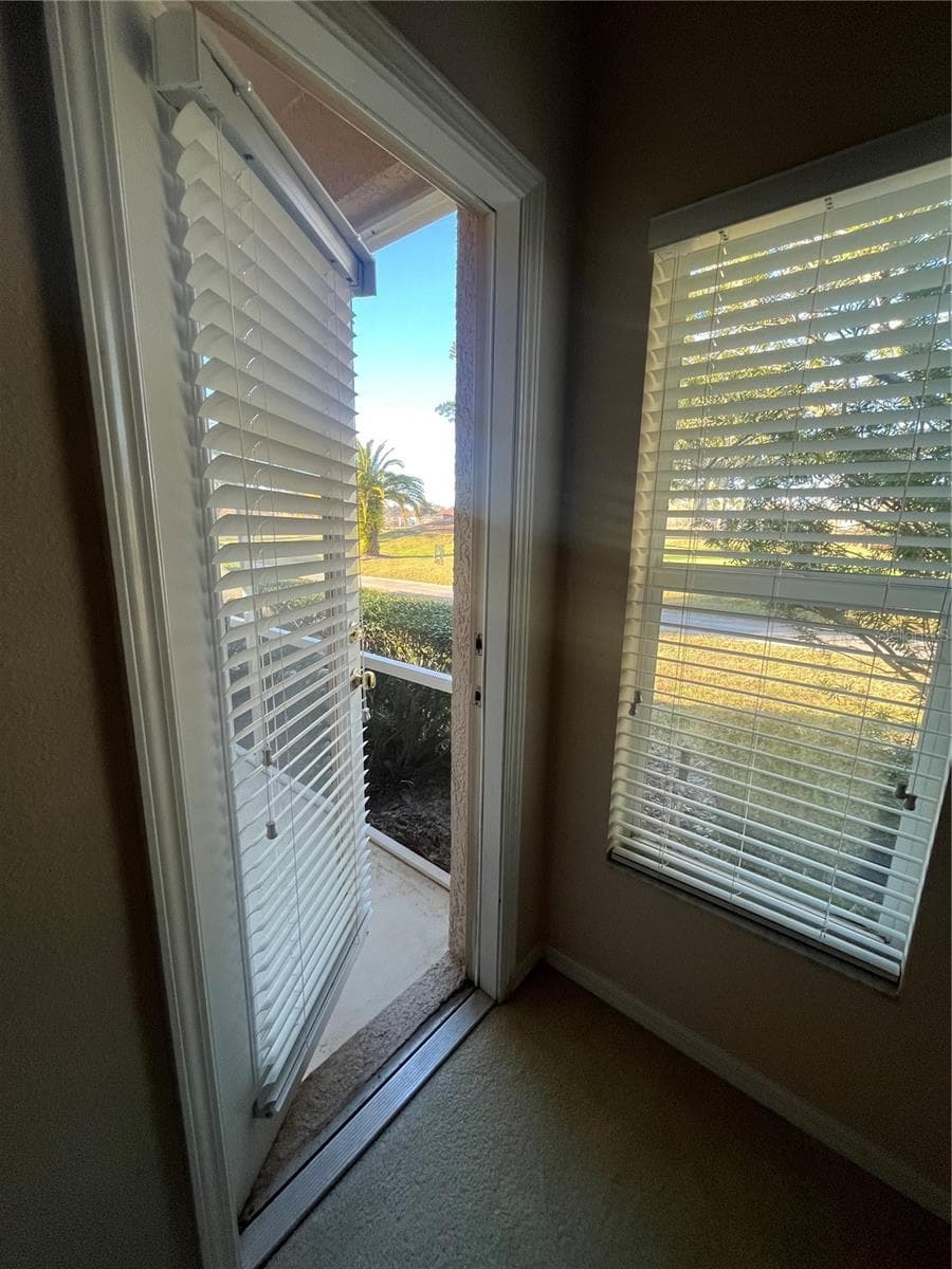 Access to Lanai from Master Bedroom - 23835 CORAL RIDGE LN, LAND O LAKES