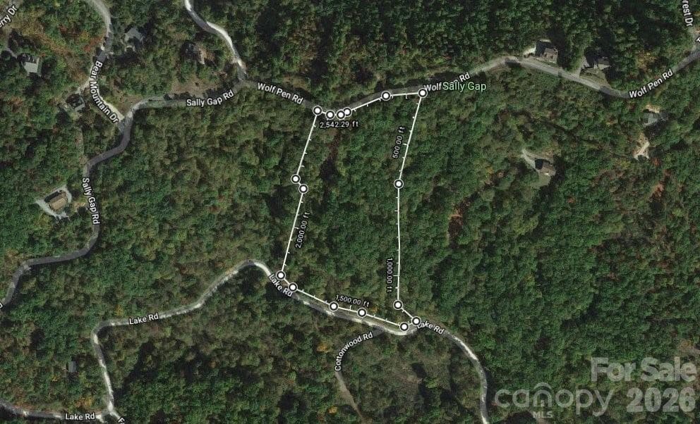 Paved access from the north and a gravel road for access from the lower lot. Amazing opportunity to build your forever home! - Old Fort