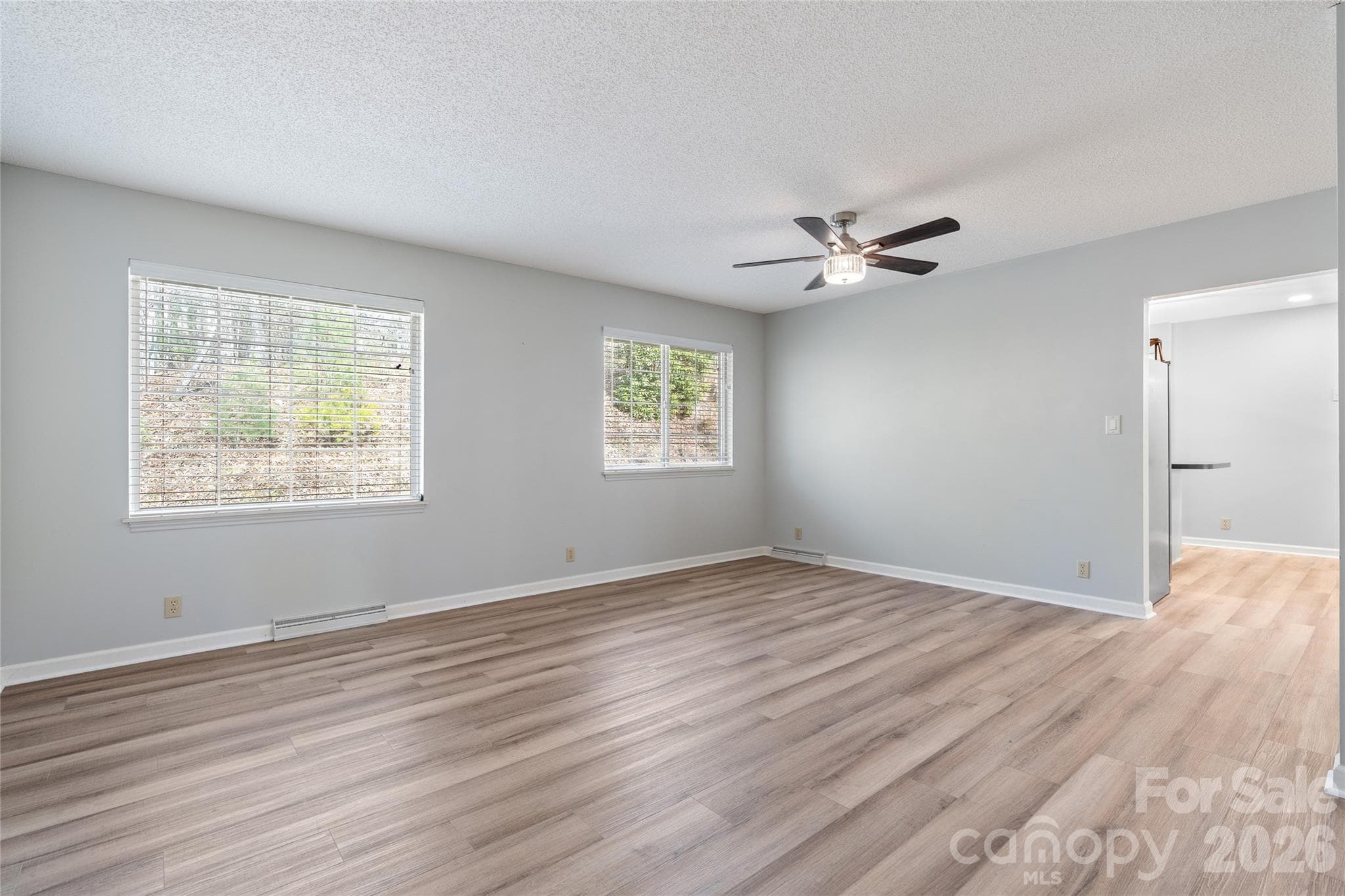 Living room into Kitchen - 177 Country Road, Brevard