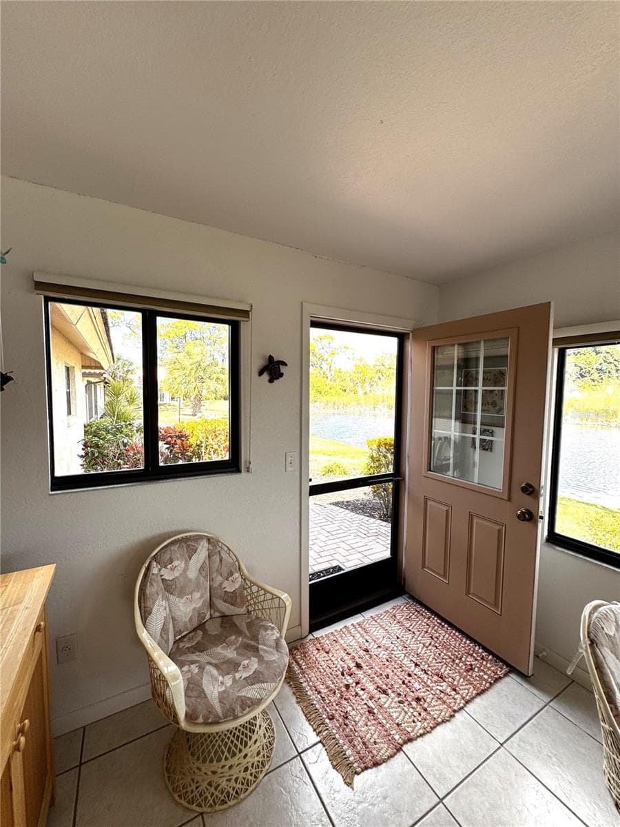 Door to the Outside Patio - 229 LAUREL HOLLOW DR #83, NOKOMIS