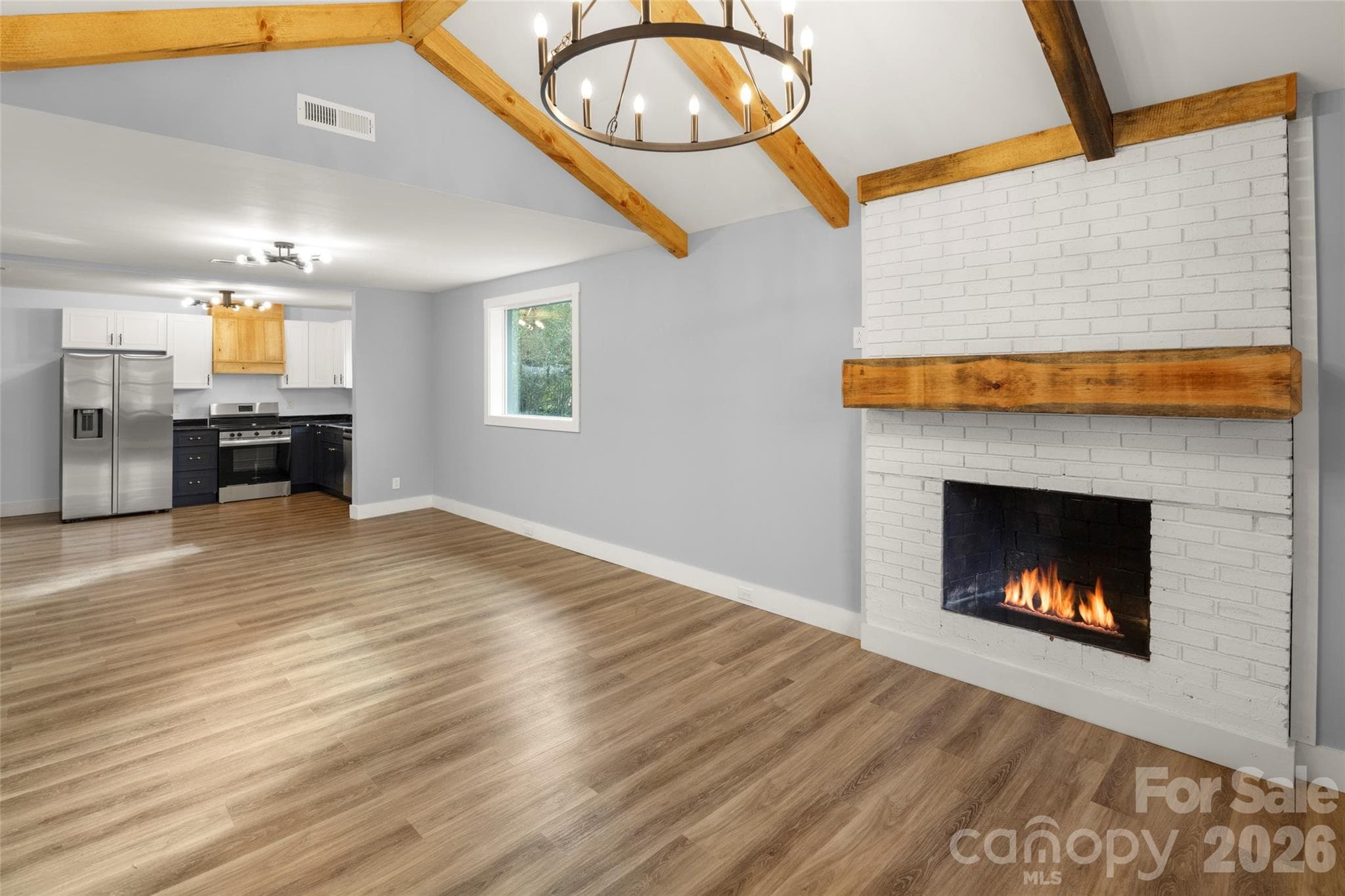 Vaulted exposed beams and cozy fireplace - Rutherfordton