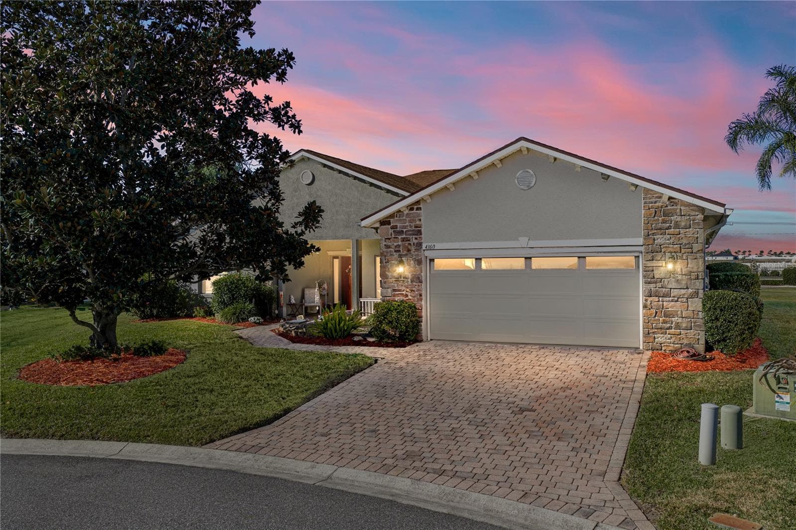 This unique alternate front elevation TAHITI floor plan home is located on a pie shaped oversides pond and golf course frontage lot. - 4360 ASHTON CLUB DR, LAKE WALES