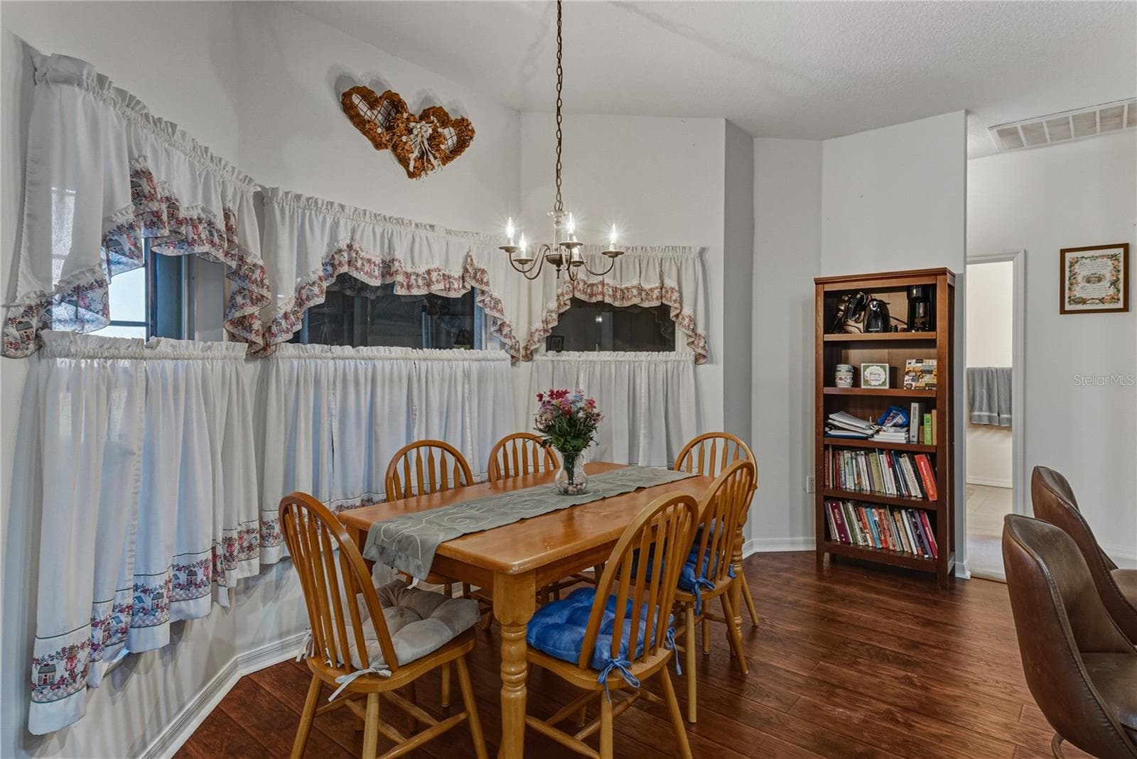 The dinette is next to the kitchen and has the passageway to the 2 guest bedrooms and the guest bath. - 4360 ASHTON CLUB DR, LAKE WALES