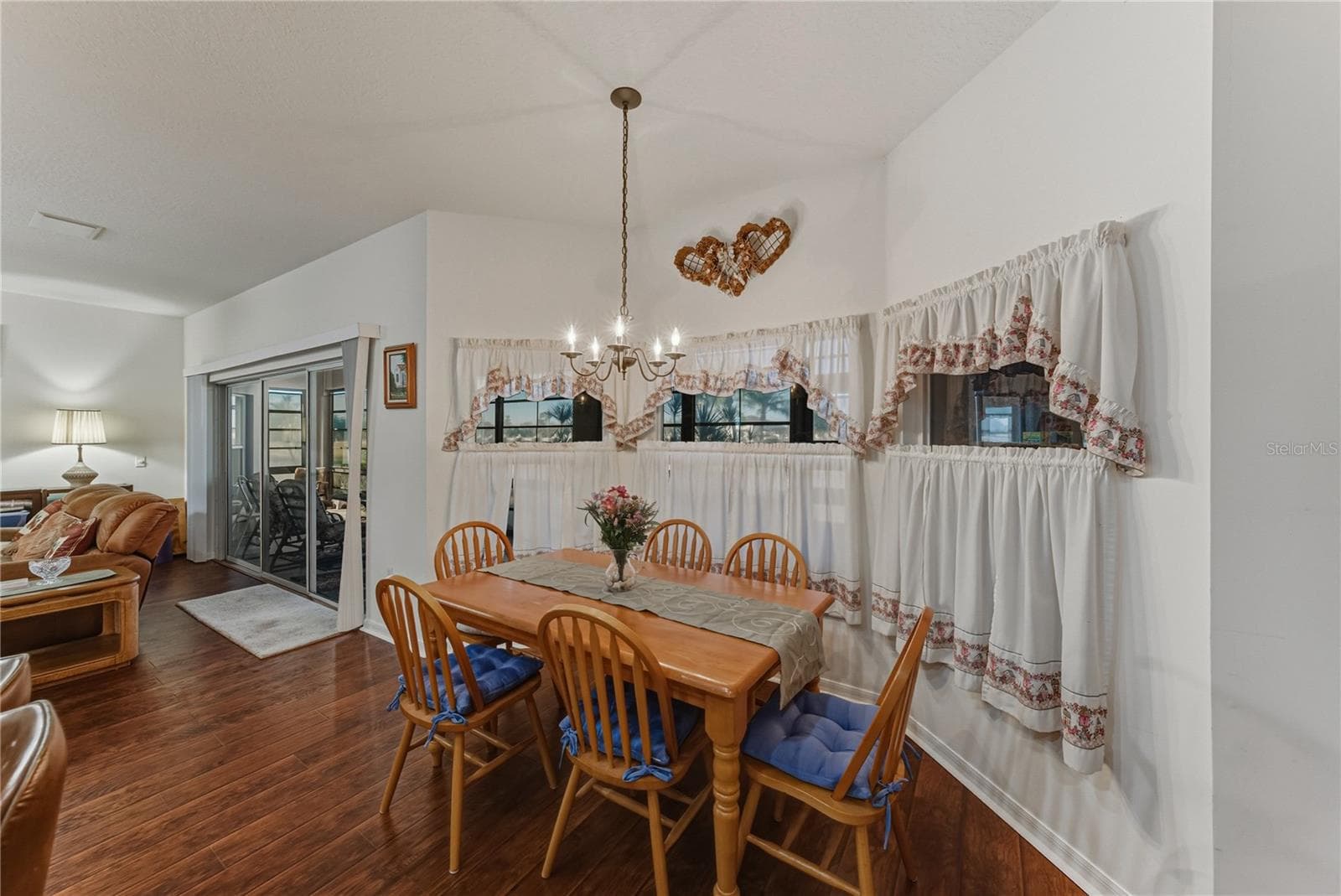 The view through the dinette windows is of the golf course and large pond at the rear of the property. - 4360 ASHTON CLUB DR, LAKE WALES