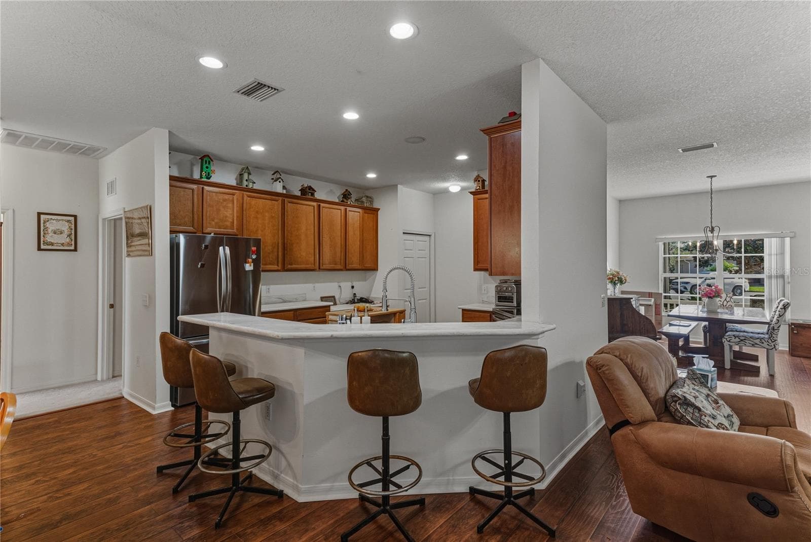 The handy snack bar is perfect for those casual meals. - 4360 ASHTON CLUB DR, LAKE WALES