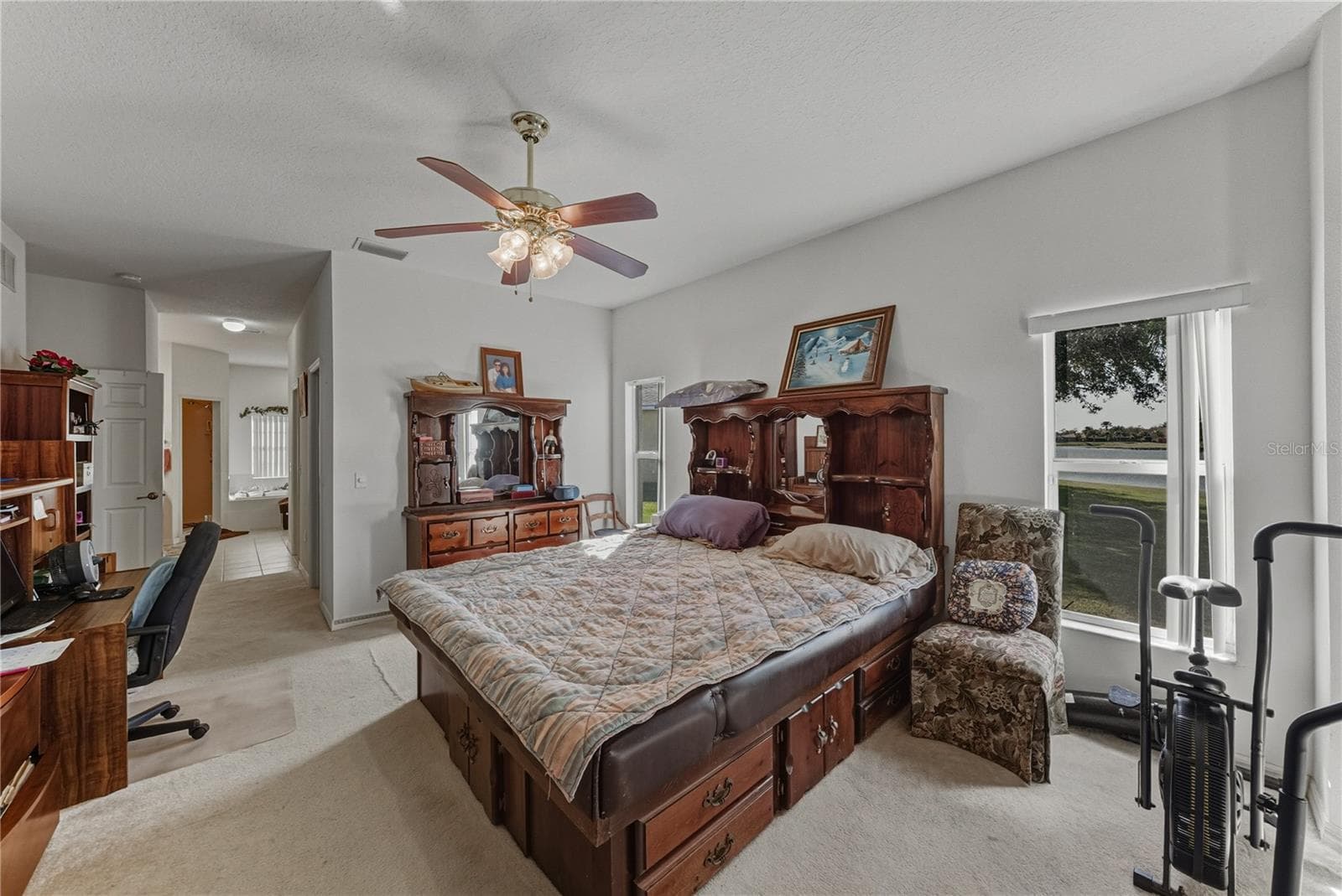 The primary suite fills the entire south wing of this split floor plan home. - 4360 ASHTON CLUB DR, LAKE WALES