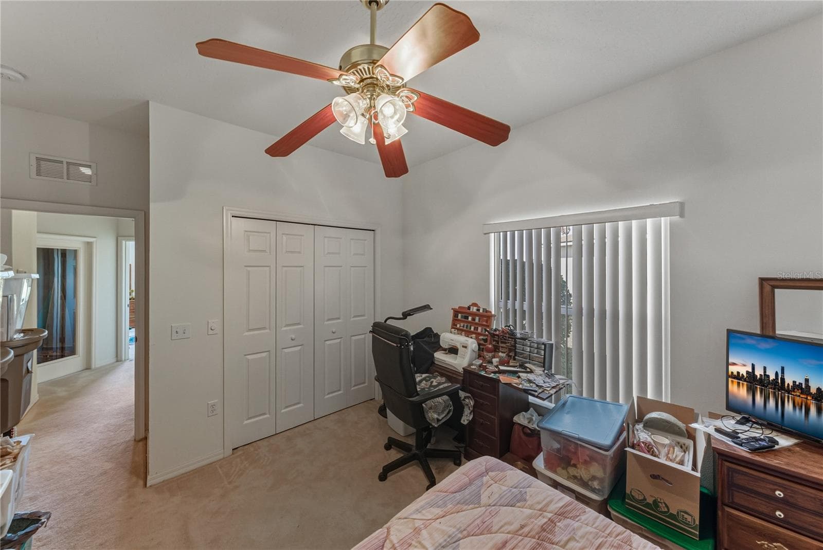 The third bedroom has a ceiling fan with light and a large reach-in closet. - 4360 ASHTON CLUB DR, LAKE WALES