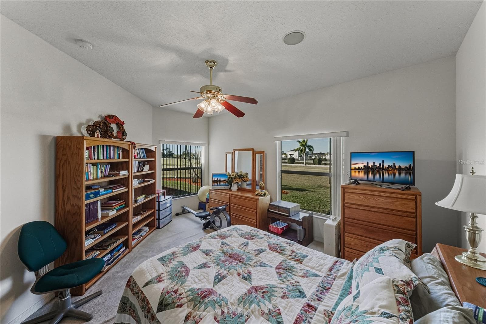 The second bedroom looks out to the tee box of Lake Ashton's East Course's 11th hole. - 4360 ASHTON CLUB DR, LAKE WALES