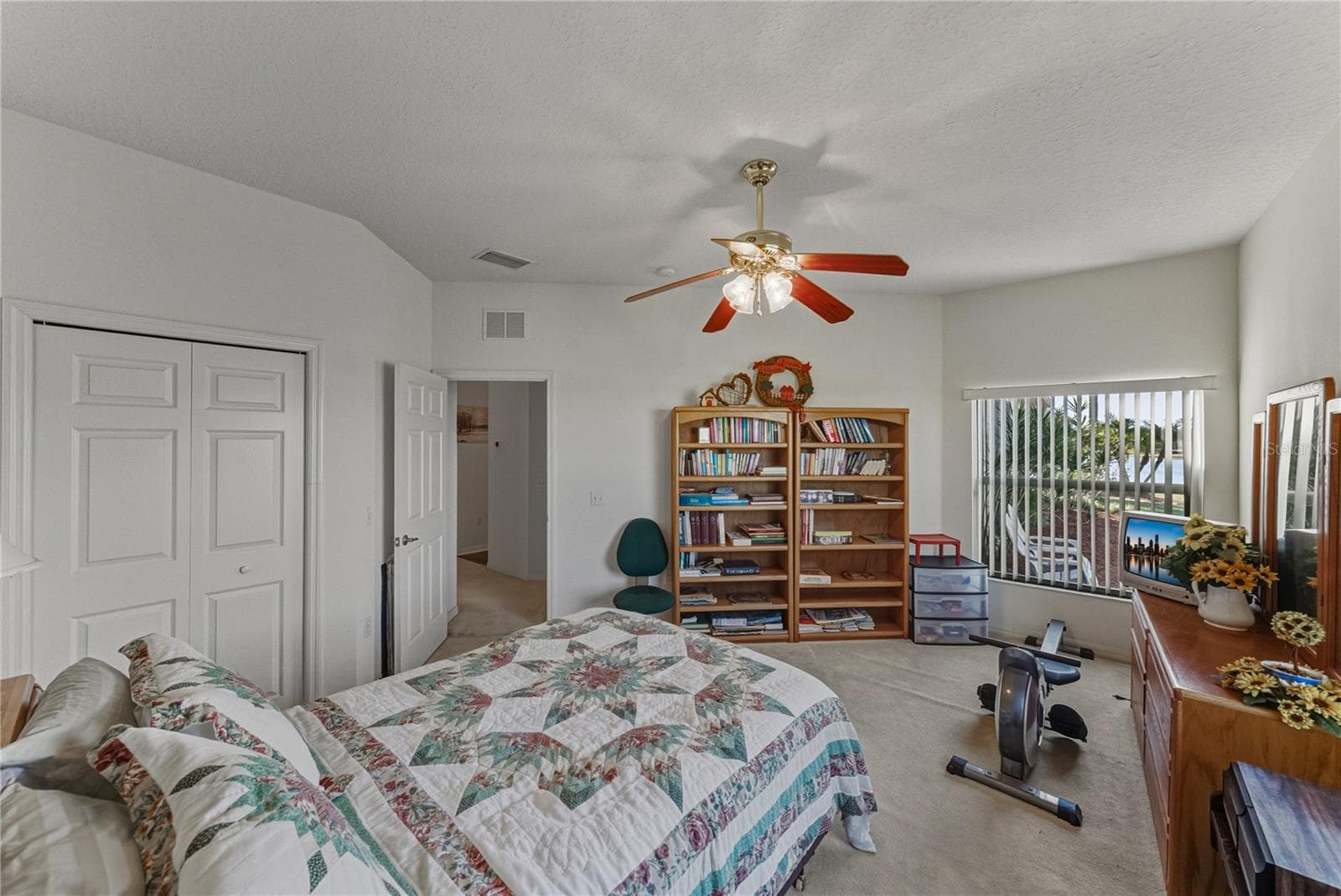 The second bedroom has a reach-in closet and is adjacent to the guest bath. - 4360 ASHTON CLUB DR, LAKE WALES