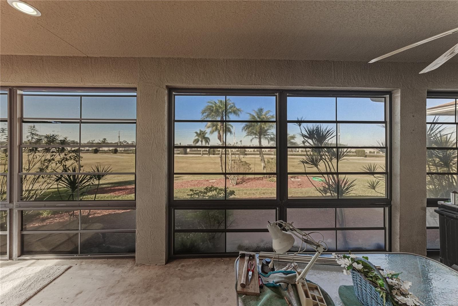 The push up windows panels can be opened to create a screened lanai. - 4360 ASHTON CLUB DR, LAKE WALES