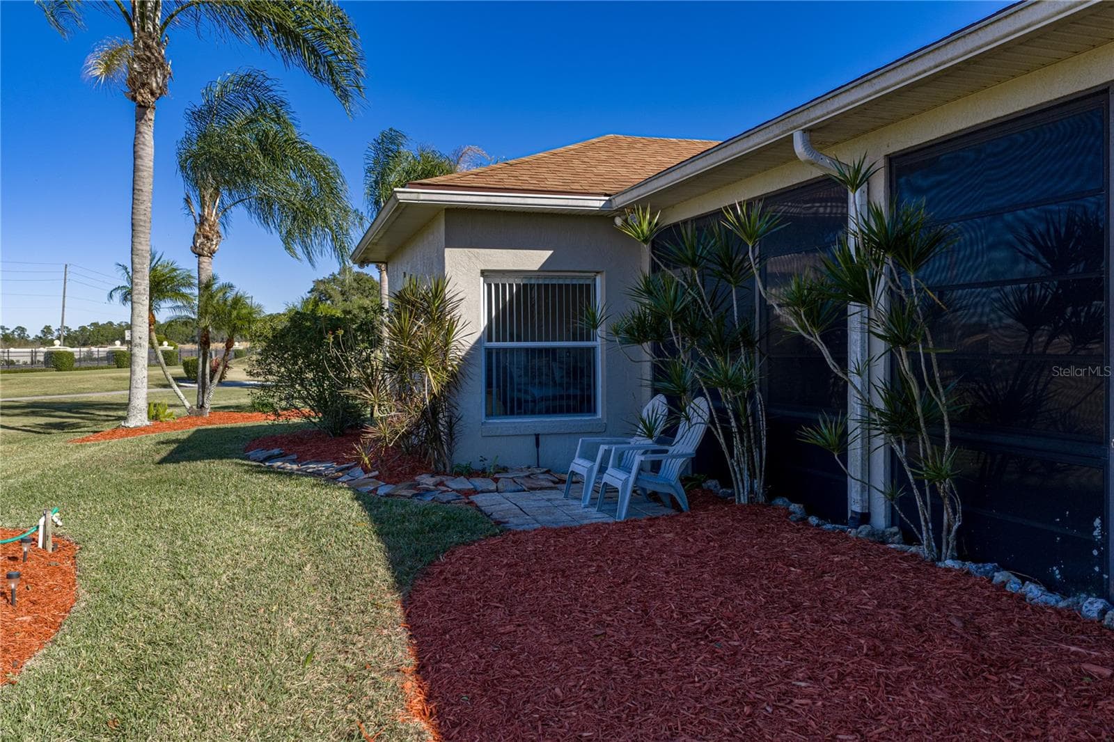 The paver patio area at the rear of the home. - 4360 ASHTON CLUB DR, LAKE WALES