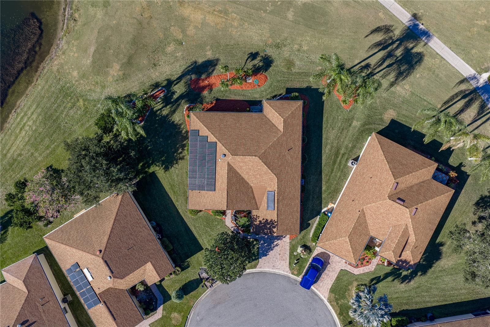 This home is located in a cul-de-sac. The home has a solar hot water heater system and a second system to offset electric bills. - 4360 ASHTON CLUB DR, LAKE WALES