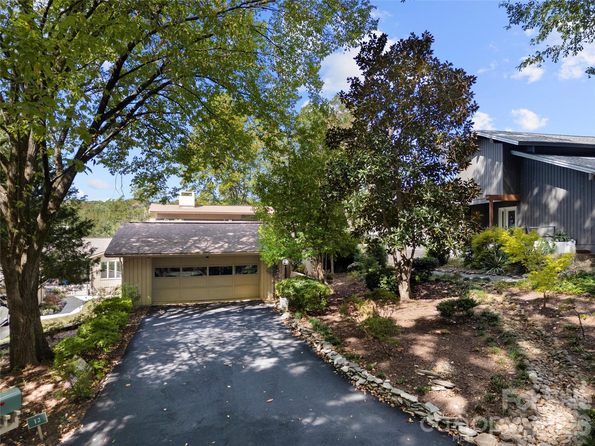 newly paved driveway to the detached 2 car garage - Clover