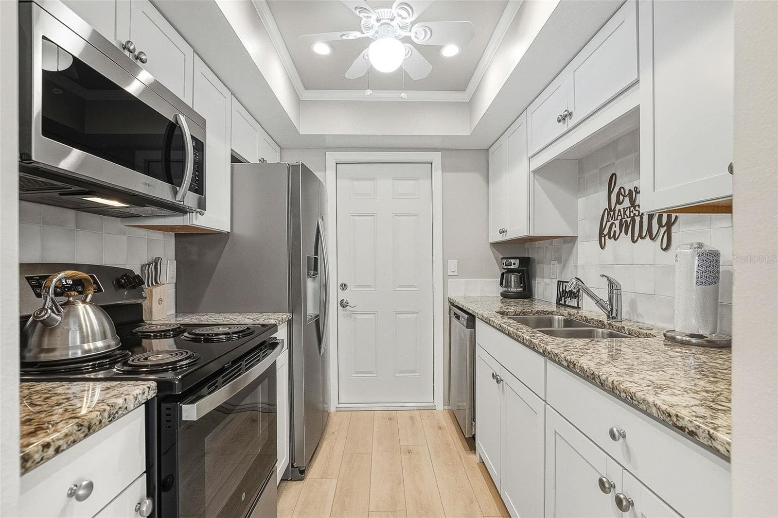 Fabulous, updated kitchen with new stainless appliances and stone countertops. - 6300 MIDNIGHT PASS RD #21, SARASOTA