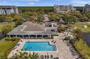 Overview of clubhouse rec center, HEATED pool and deck with hot tub - 2333 FEATHER SOUND DR #B304, CLEARWATER