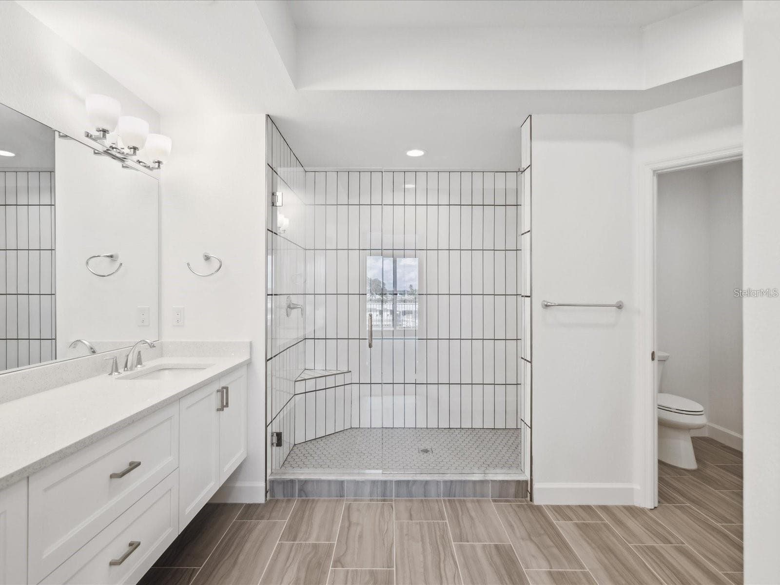 Primary bath has private water closet/ - 125 ISLAND WAY #304, CLEARWATER BEACH