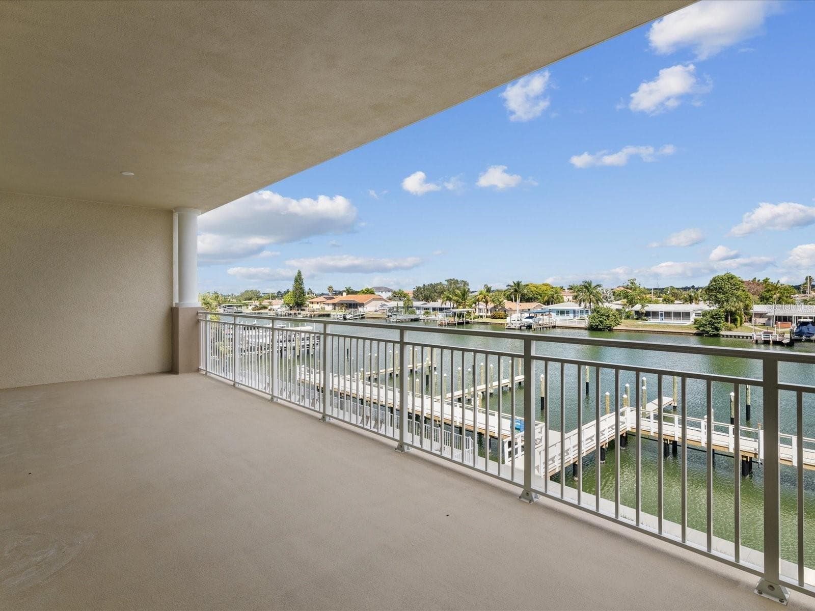 30' long balcony, with ceiling fan outlets, electricity and water spicket. - 125 ISLAND WAY #304, CLEARWATER BEACH