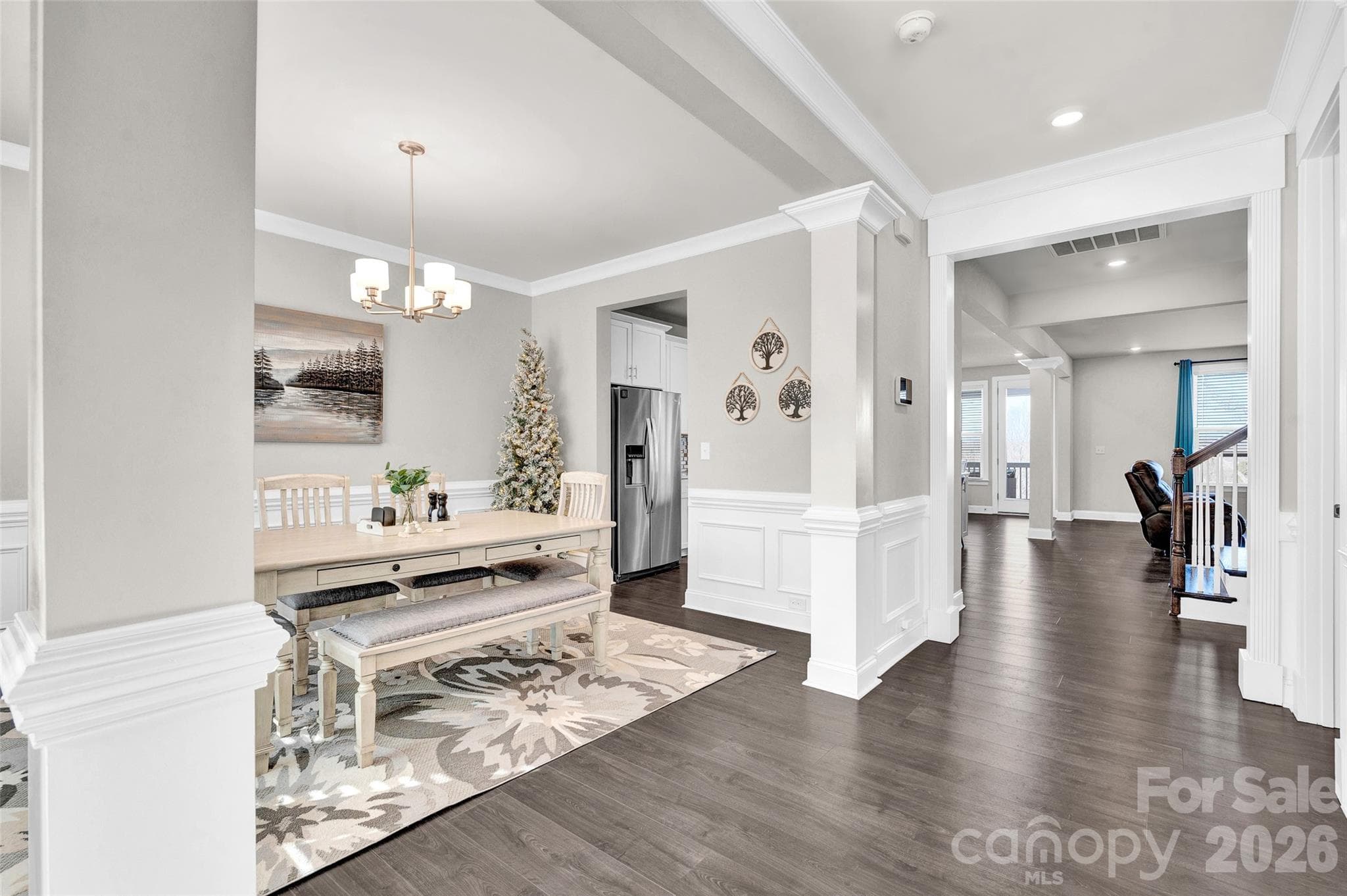 Bright Open entryway with formal dining to the left - Mooresville