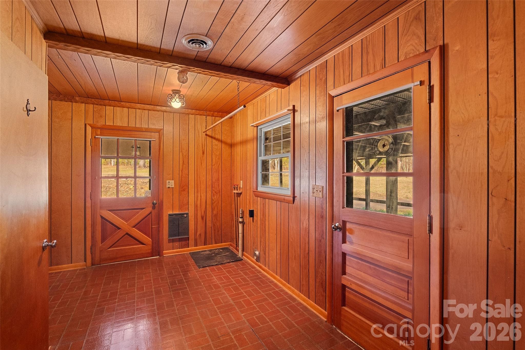 Laundry room is pretty expansive.  Built in shelving is recessed to the left - 591 Landrum Road, Columbus