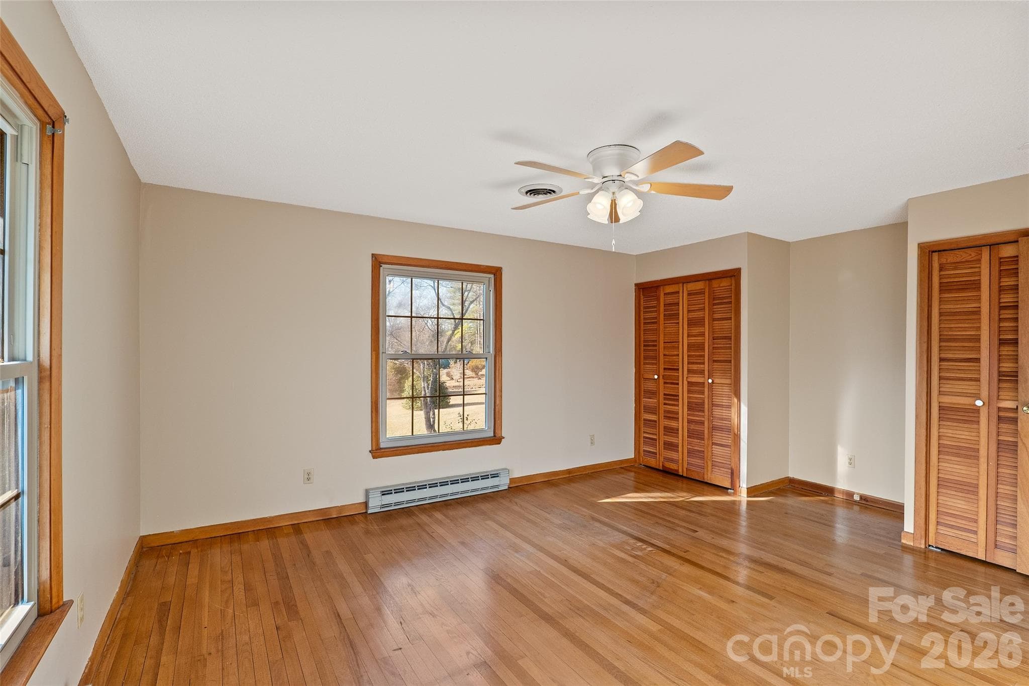 Bedroom one with oak hardwood floors - 591 Landrum Road, Columbus