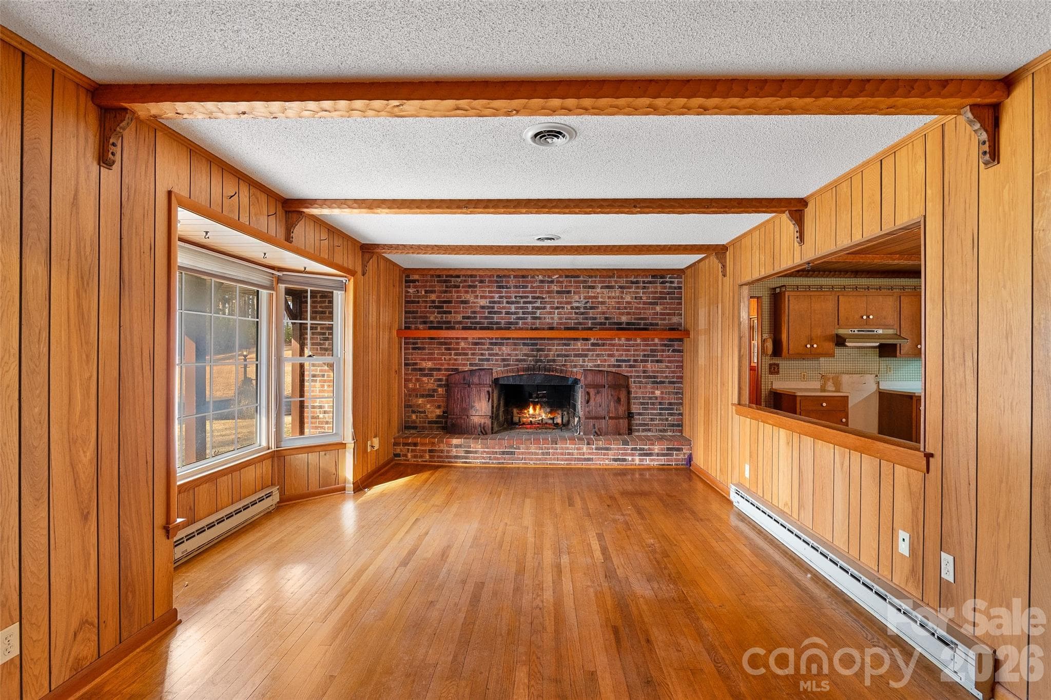 Use your imagination as to what you can create!  Beautiful fireplace (needs re-pointed), oak wood floors and wood beamed ceiling! - 591 Landrum Road, Columbus