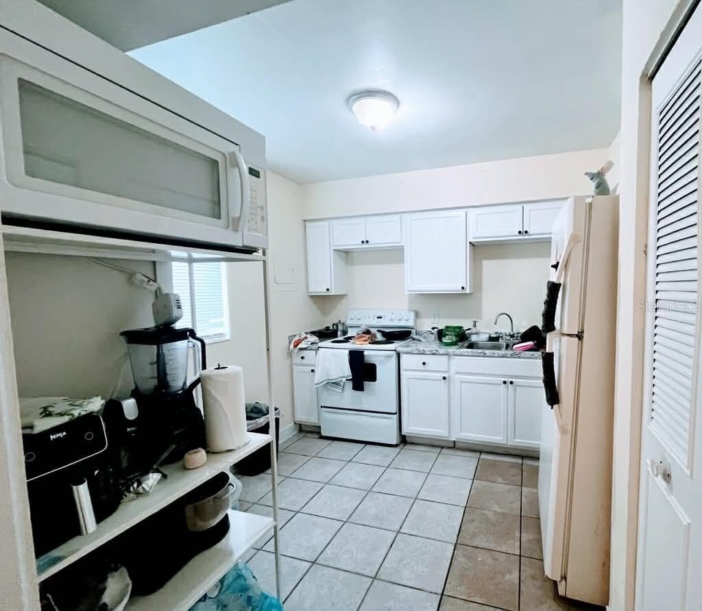 Condominium at 5885 DAHLIA DR #29/115, ORLANDO, photo 4 of 7