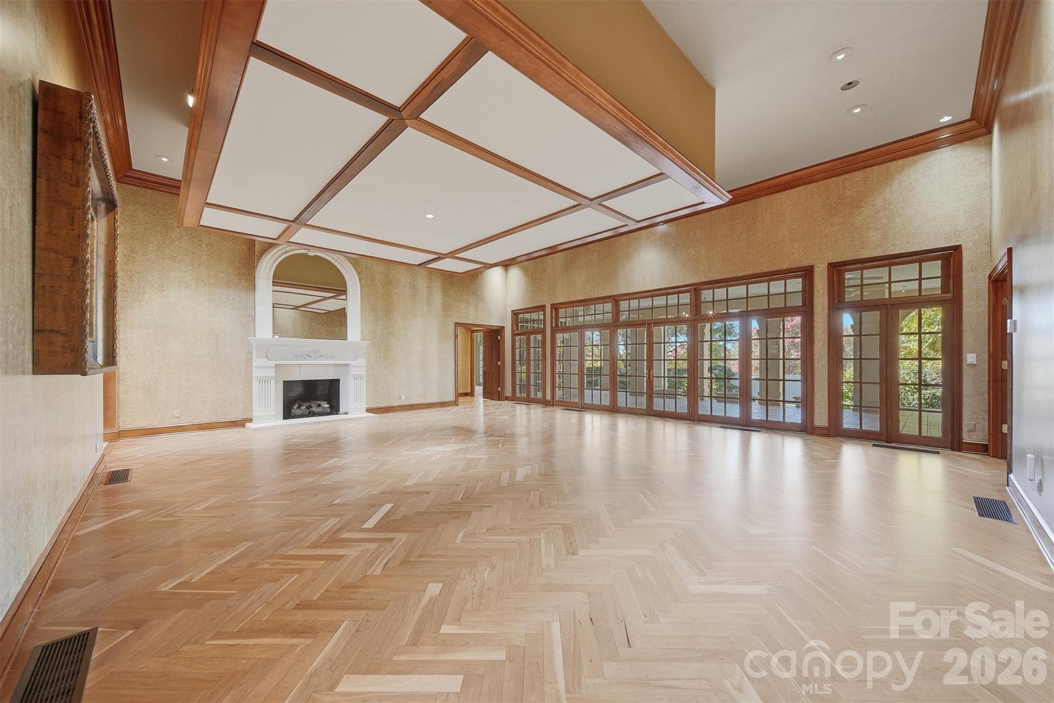 Open living room with beautiful American Cherry hardwood floors and abundant natural light. - 3619 Links Drive NE, Conover