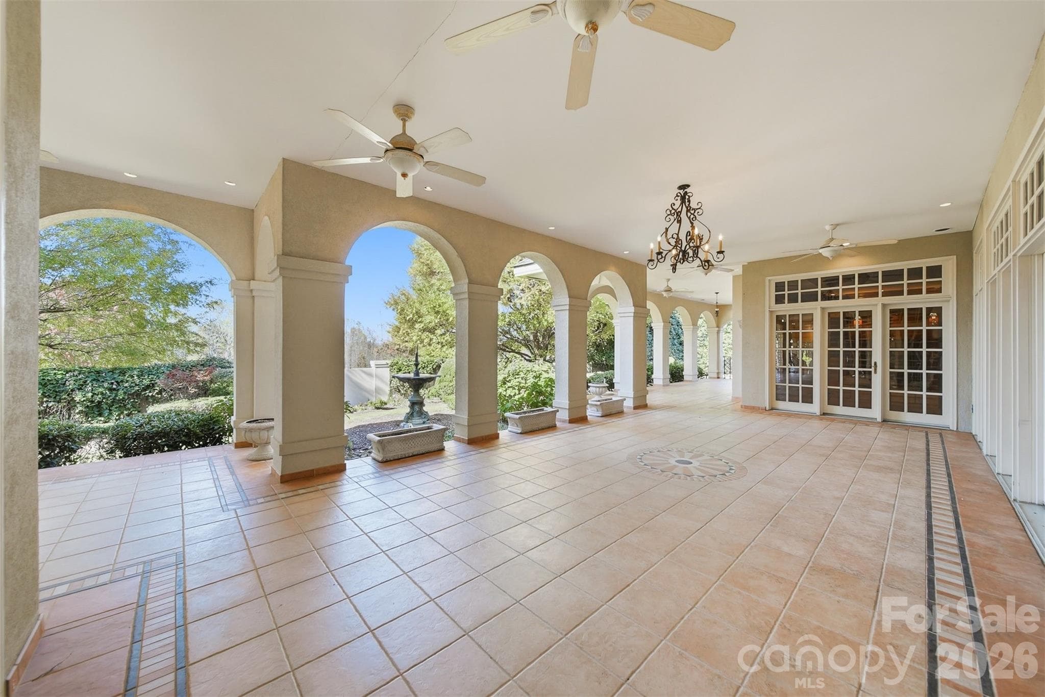 Covered outdoor living area overlooking the Tom Jackson Championship Golf Course. - 3619 Links Drive NE, Conover