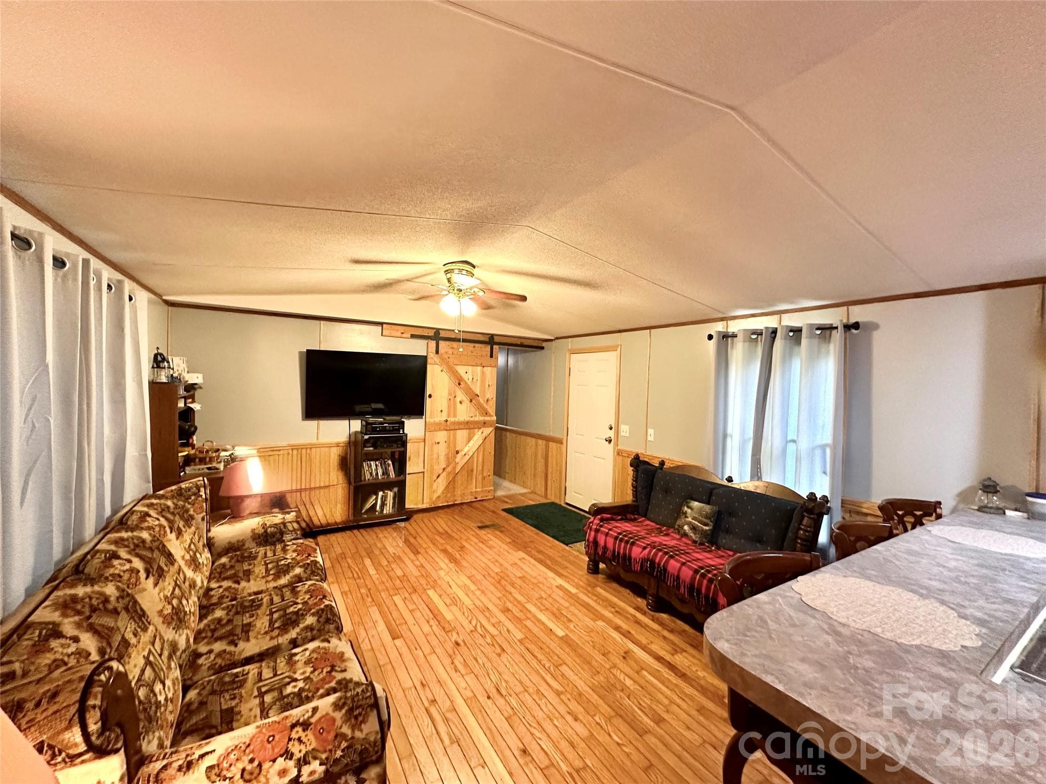 Spacious Living Room with Oak Hardwood Floors - 492 Chestnut Mountain Road, Spruce Pine