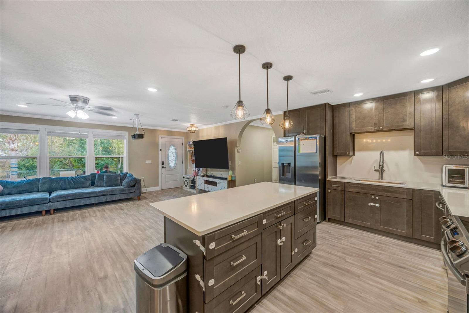 View of kitchen from dining room - 7149 SPRUCE DR, WEEKI WACHEE