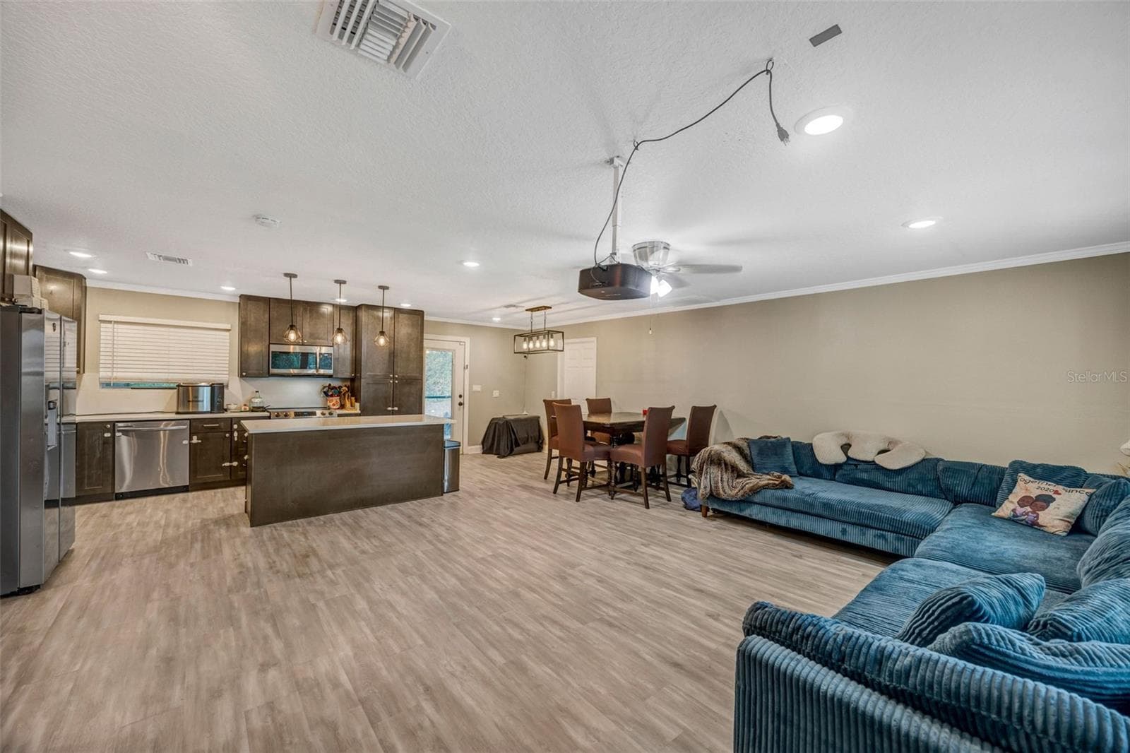 View of great room from front door - 7149 SPRUCE DR, WEEKI WACHEE